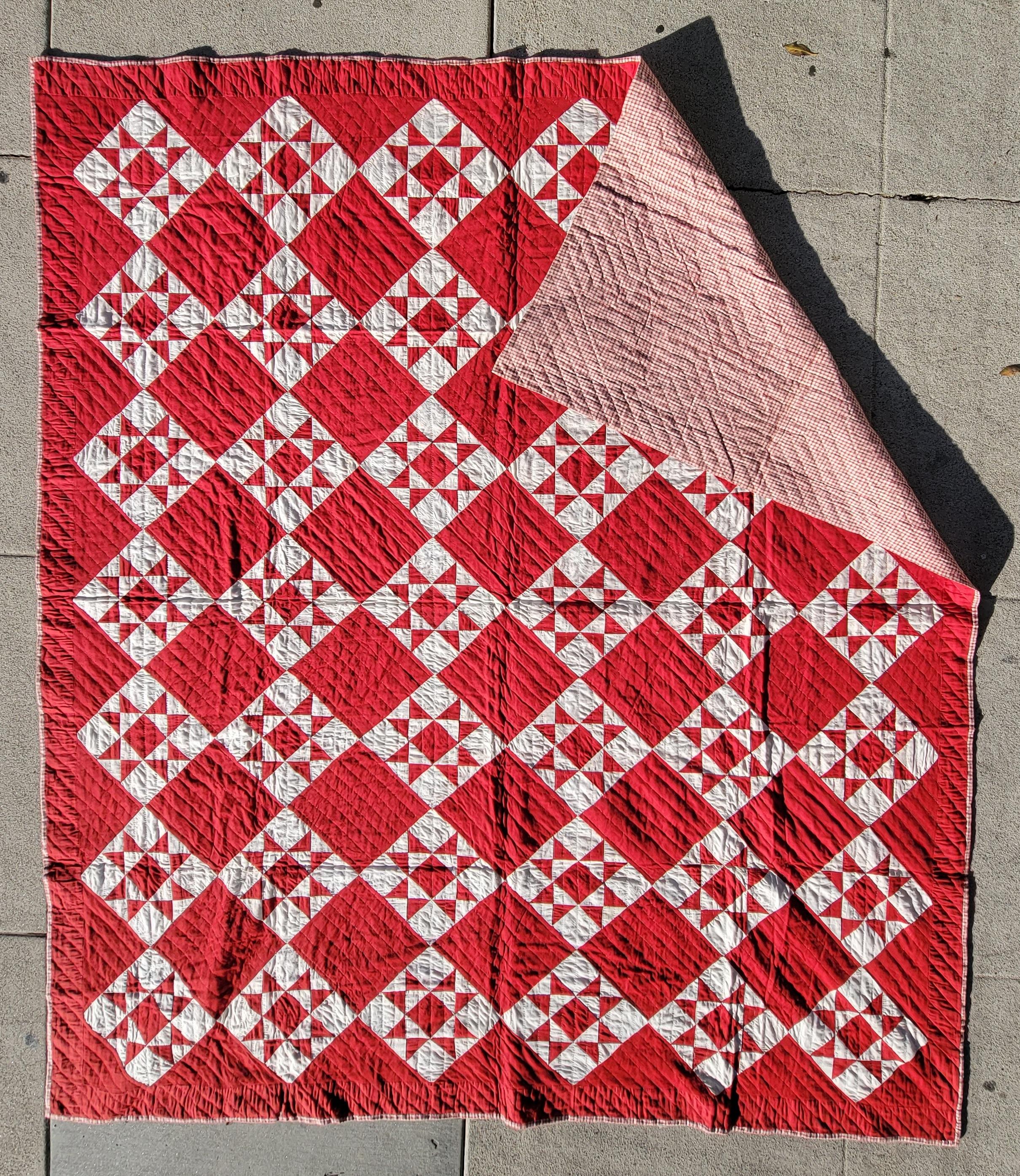 This fine folky red & white eight point star is in pristine condition and has an amazing red & white checked gingham backing. Was found in a private estate in Ohio. Just amazing deep red color !