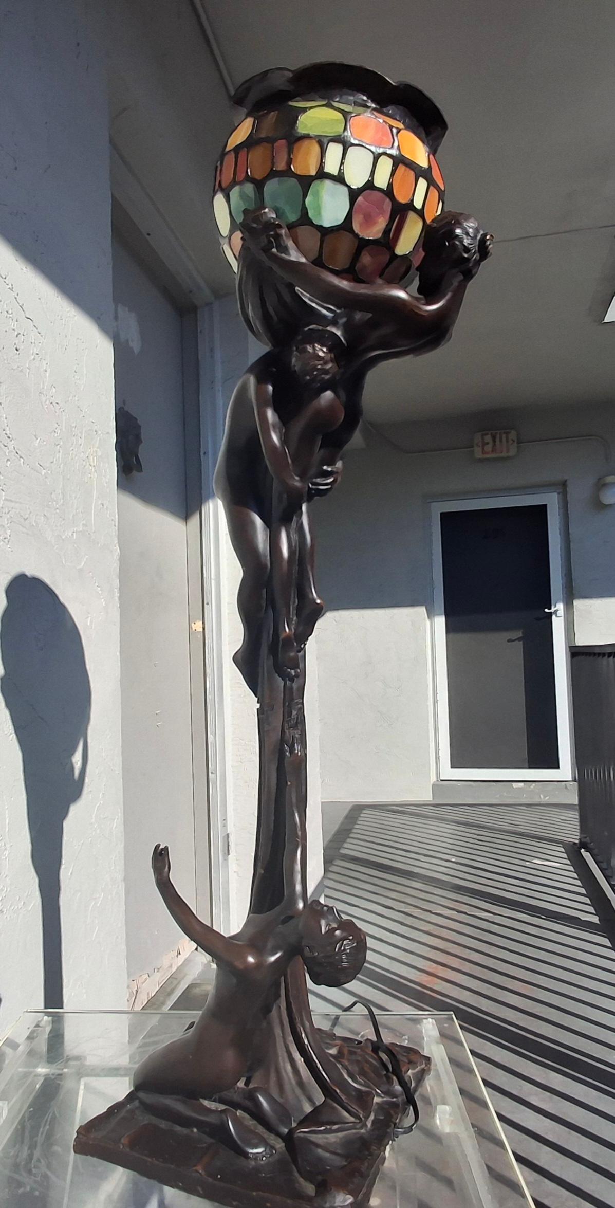 Monumental 19thc Austrian Art Nouveau Bronze Figural Floor/ Table Lamp. Featuring original Tiffany style tiled Art Glass Shade. Signed by Artist Gustave Gurschner. Large and heavy Sculptural Lamp.