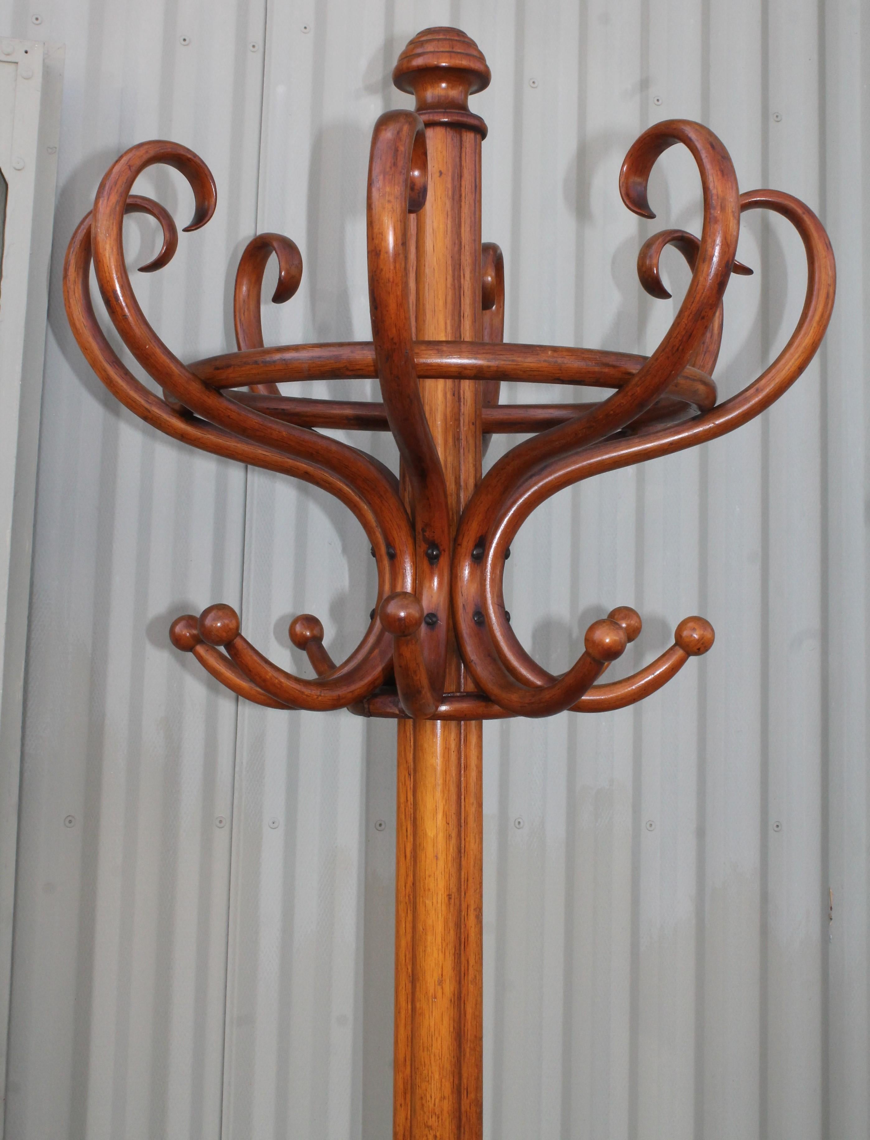 This fine old hickory bentwood hat & cot rack is in fine condition. It has a fantastic aged patina and is in fine condition. This a very heavy and sturdy coat stand.