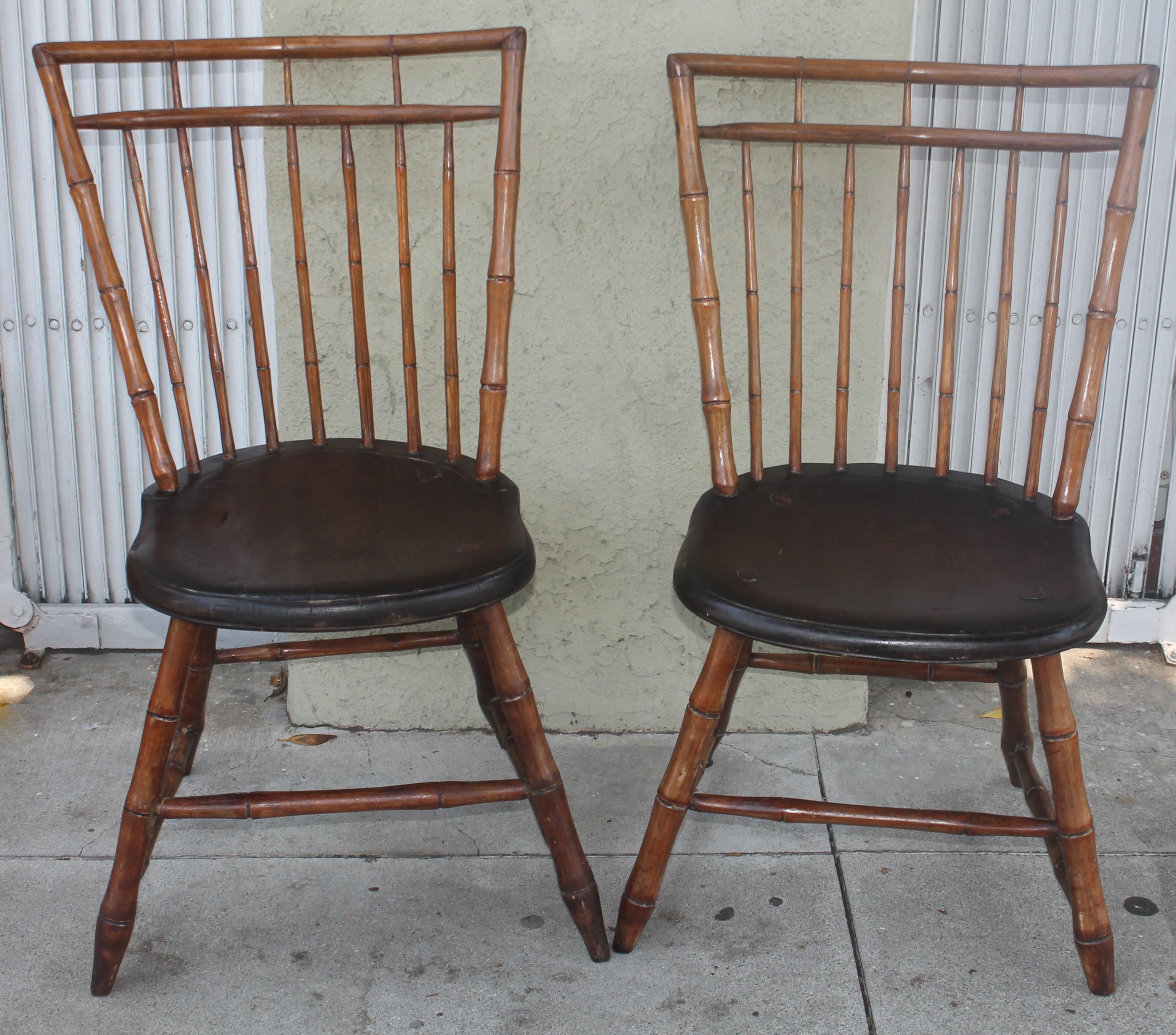 These amazing bamboo turnings Windsor chairs were found in Pennsylvania and are in fine sturdy condition. Fantastic plank seats and wonderful aged patina. All peg and early cut nail construction.