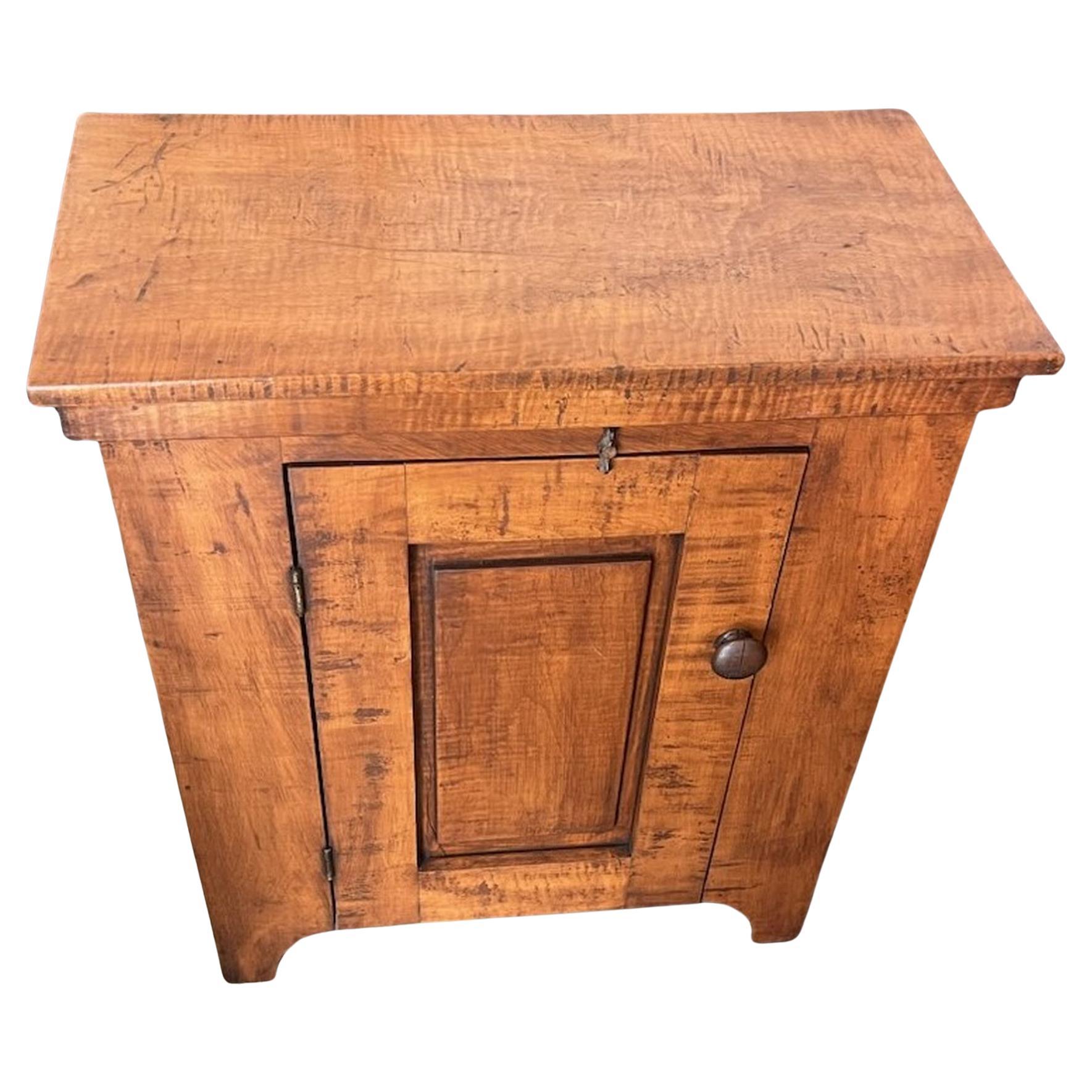 19Thc Birdseye Maple floor cabinet with original hardware and fine patina.It looks like it has a later wood backing.The condition is very good.