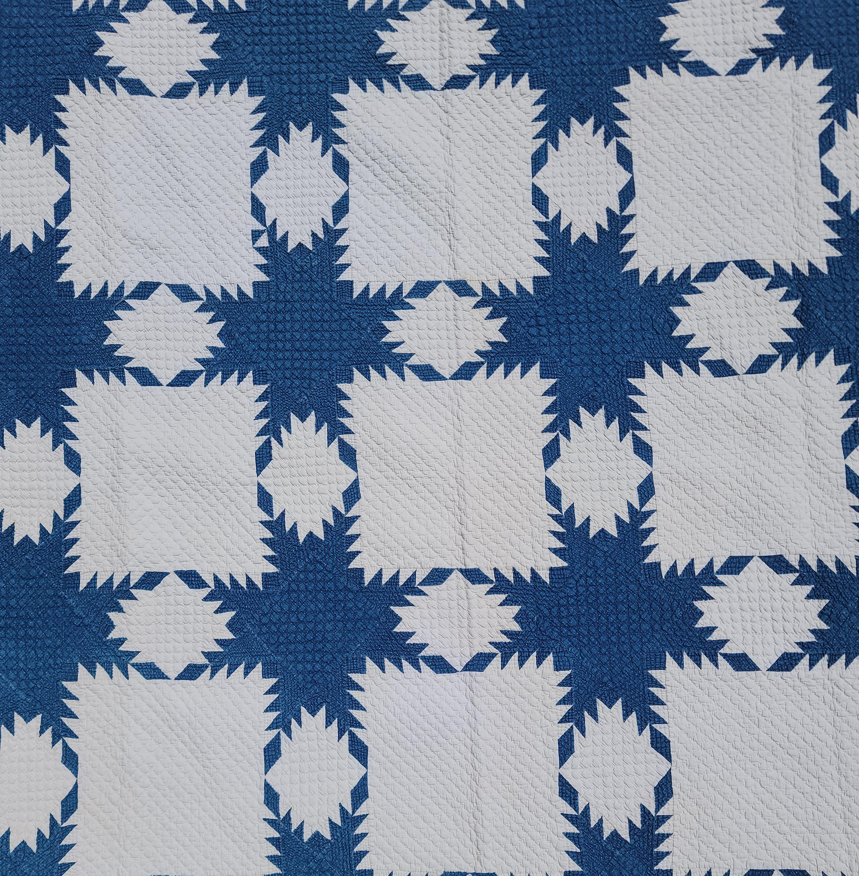 Folk Art 19th Century Blue and White Feathered Star Quilt