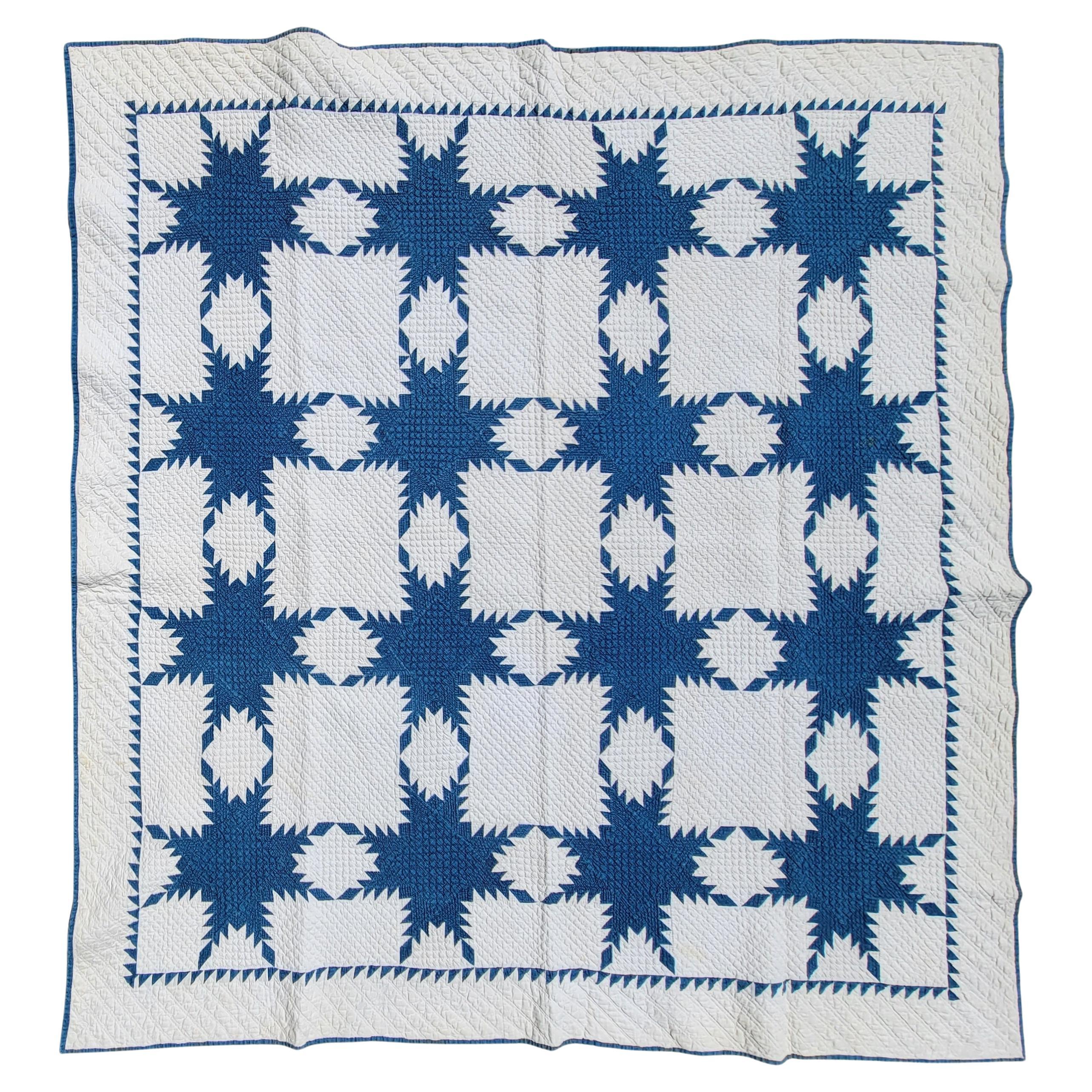 19th Century Blue and White Feathered Star Quilt