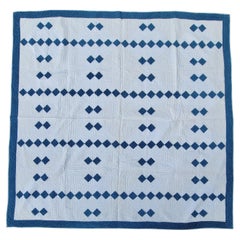 Quilt de nœud papillon bleu et blanc du 19ème siècle