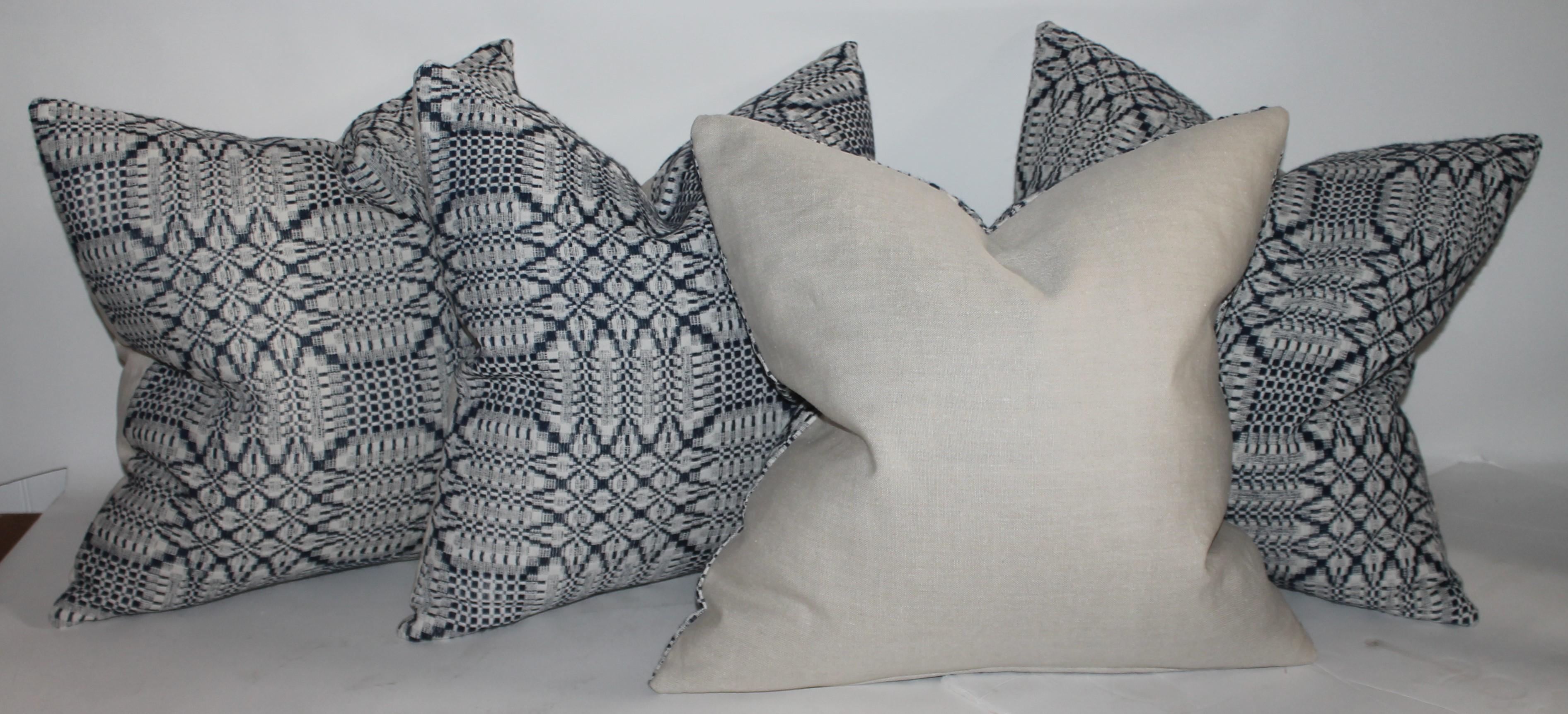 These fine hand woven robin egg blue coverlet pillows are in pristine condition white linen fabric backings. The inserts are down & feather fill.