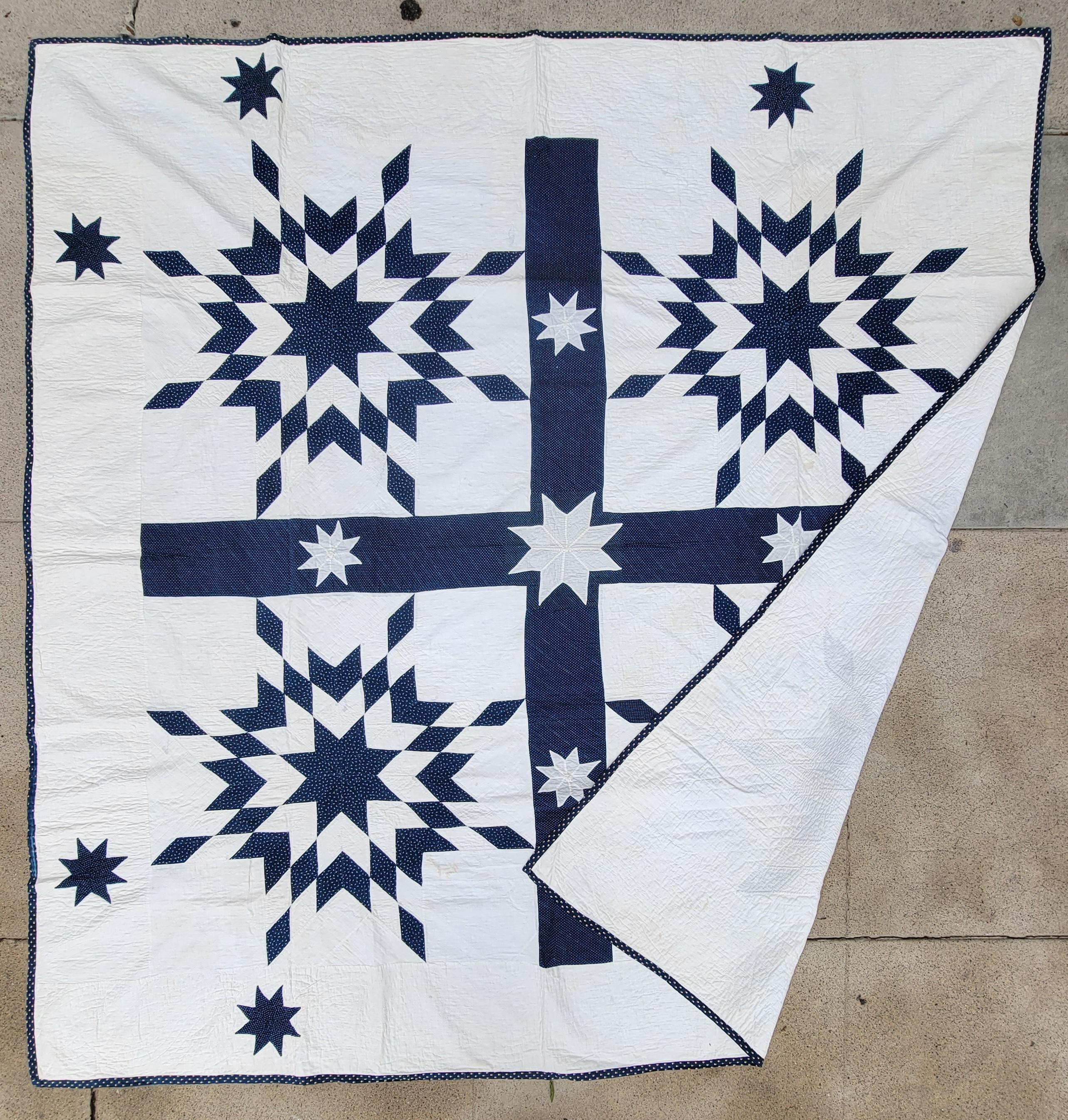 This amazing and most unusual 19Thc folky stars blue & white quilt was found in New England and in fine condition. Most unusual hand appliqued floating stars throughout.This is more then likely a original pattern.