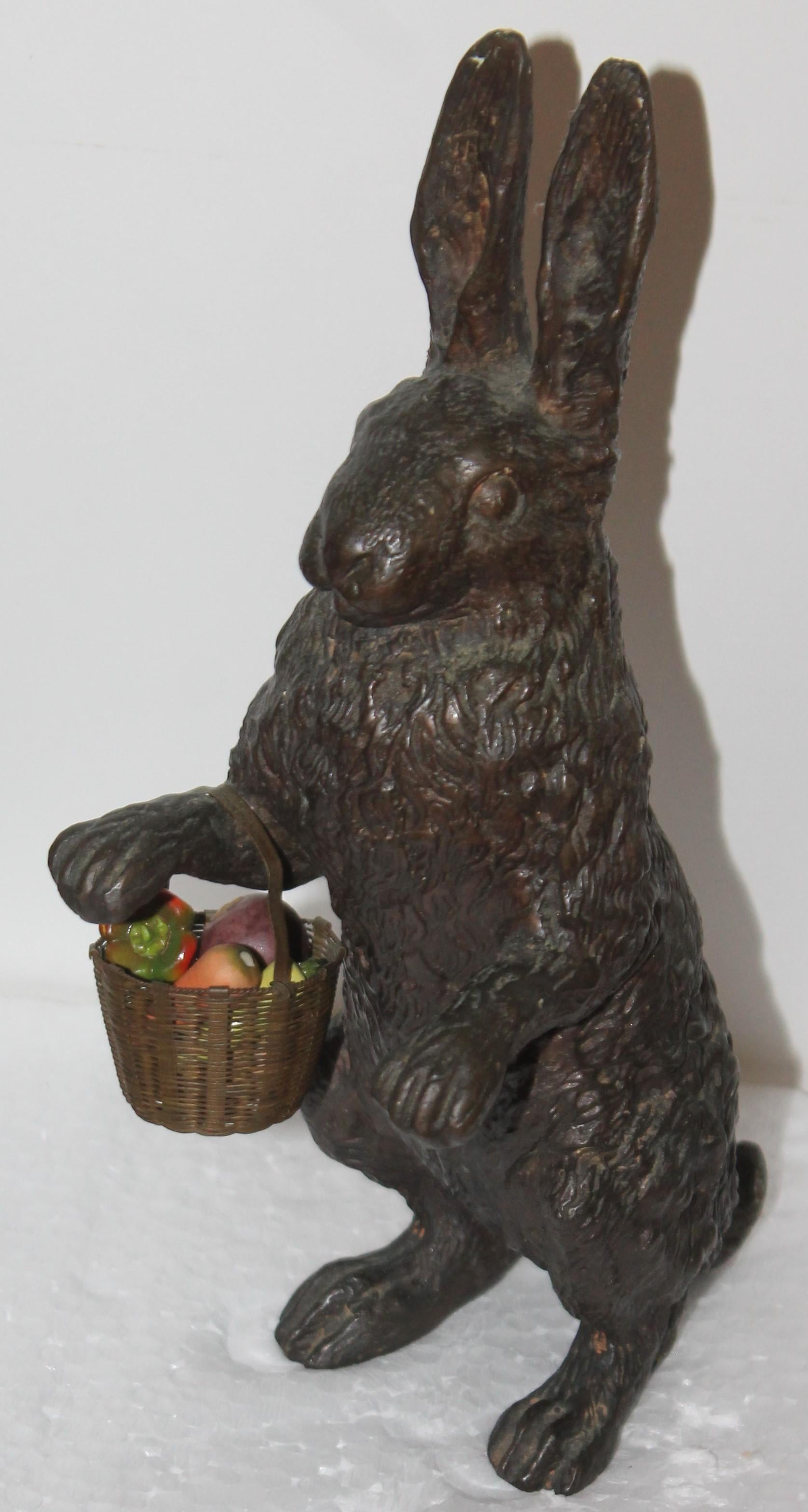 19th century bronze rabbit in fine condition with a brass basket of alabaster fruit. The condition is very good. The rabbit has a amazing aged patina.