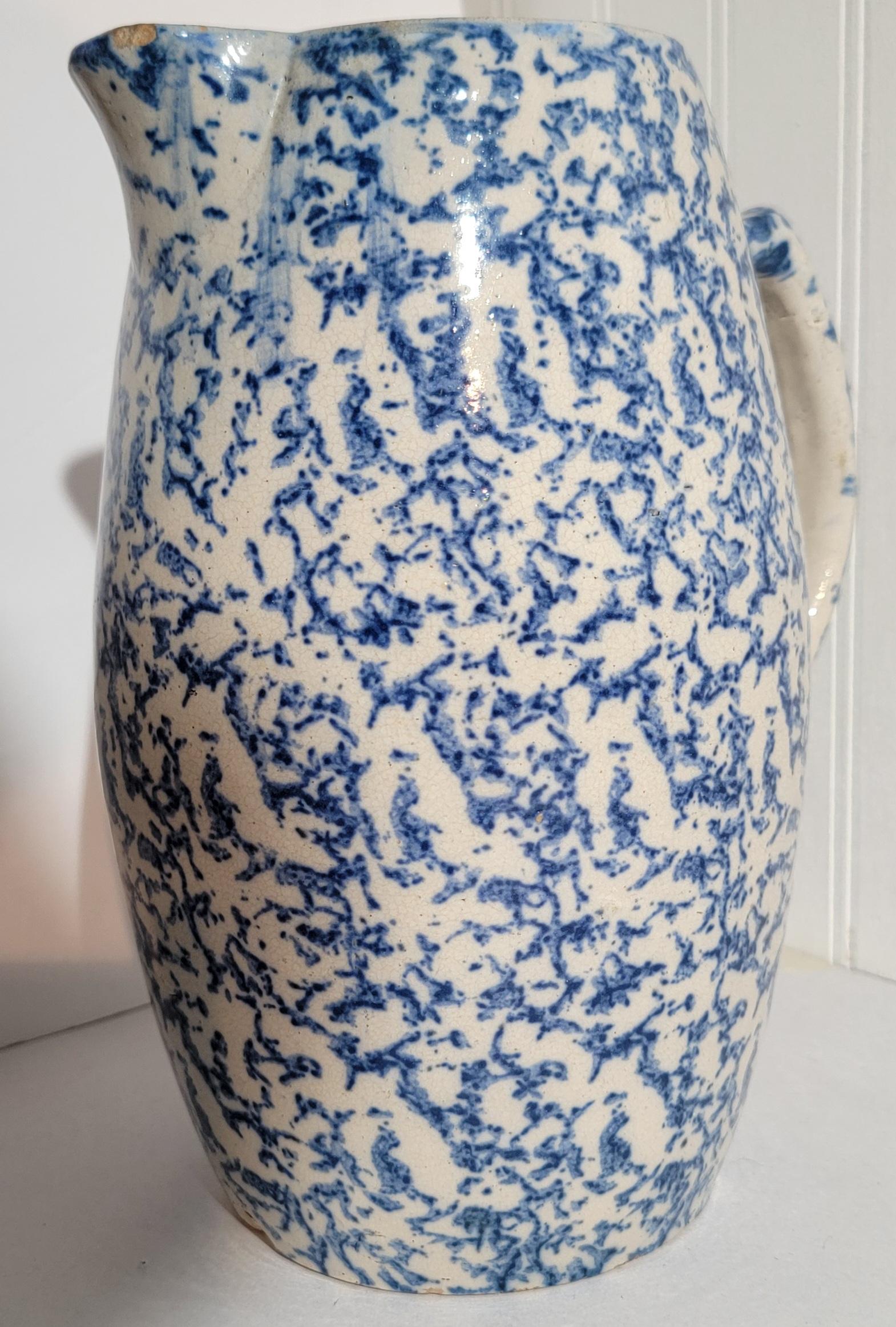 19thc sponge ware pitcher with bulbous design. Blue and white sponge patter. Has a wonderful design and size. 