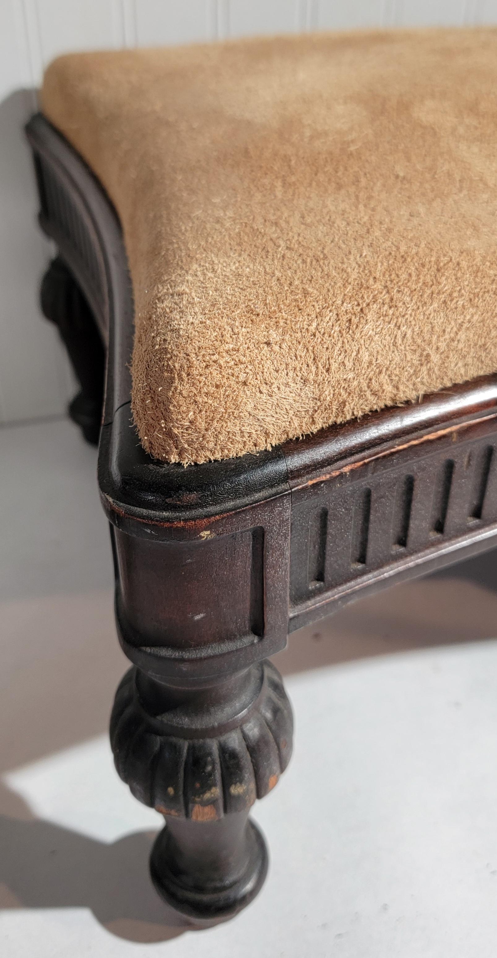 Beautiful hand carved 19thc foot stool with suede top. Very beautiful design to the legs and the sides. Great size and very strong and sturdy.