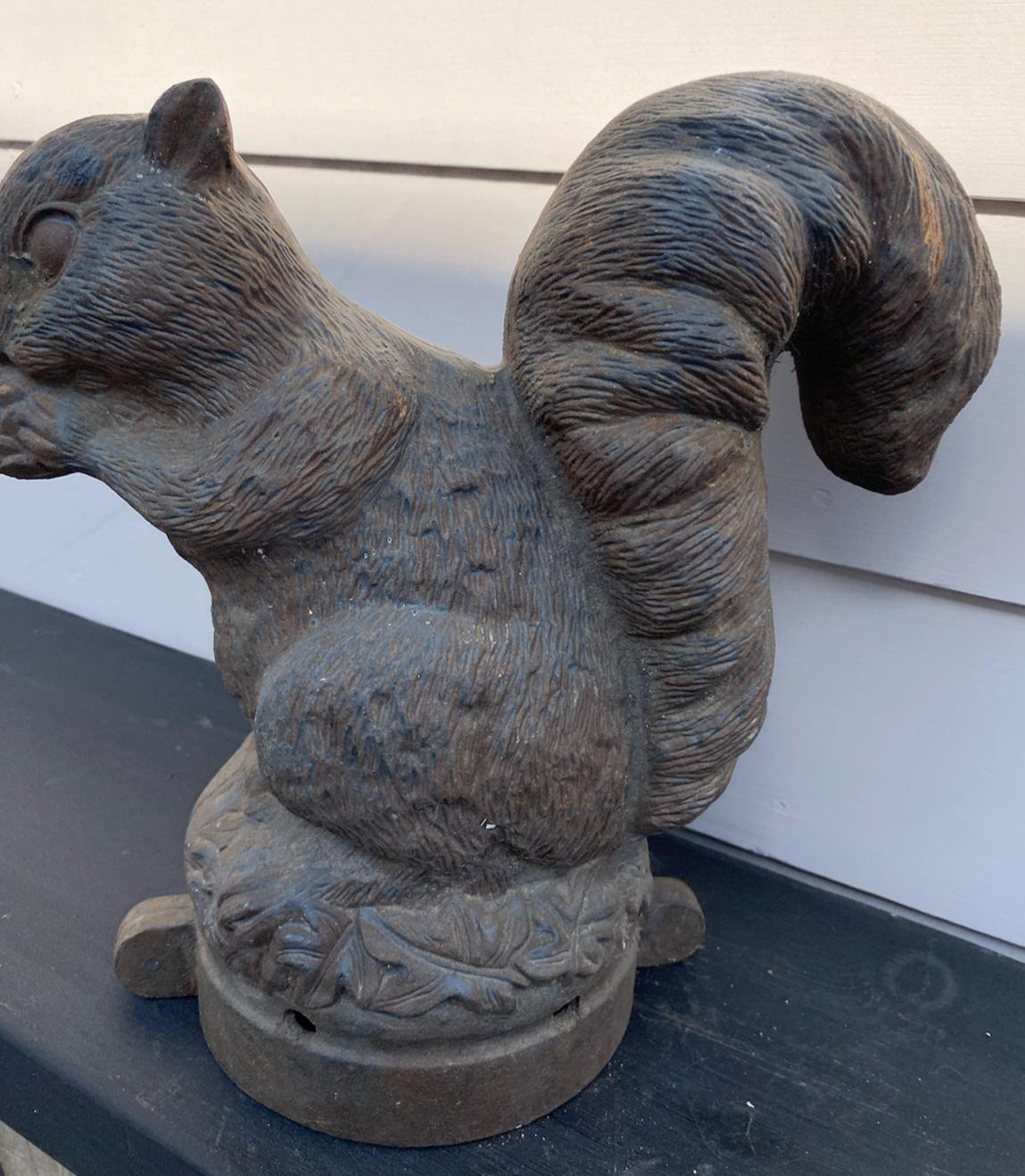 19Thc Original  cast iron squirrel from a fence post.Found in New England.There is fragments of grey paint on the surface. No cracks or loss.