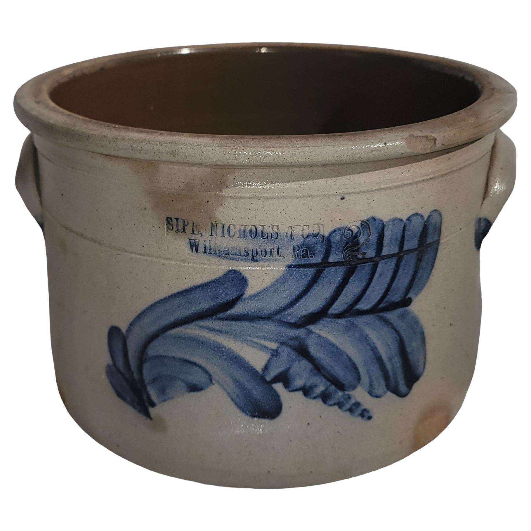 This fine Sipe & Nichols decorated stoneware cake crock has amazing hand painted blue decoration and in very good condition.Minor rim chip as you can see in the close up photo.This is stamped Williamsport,Pennsylvania and stamp 
