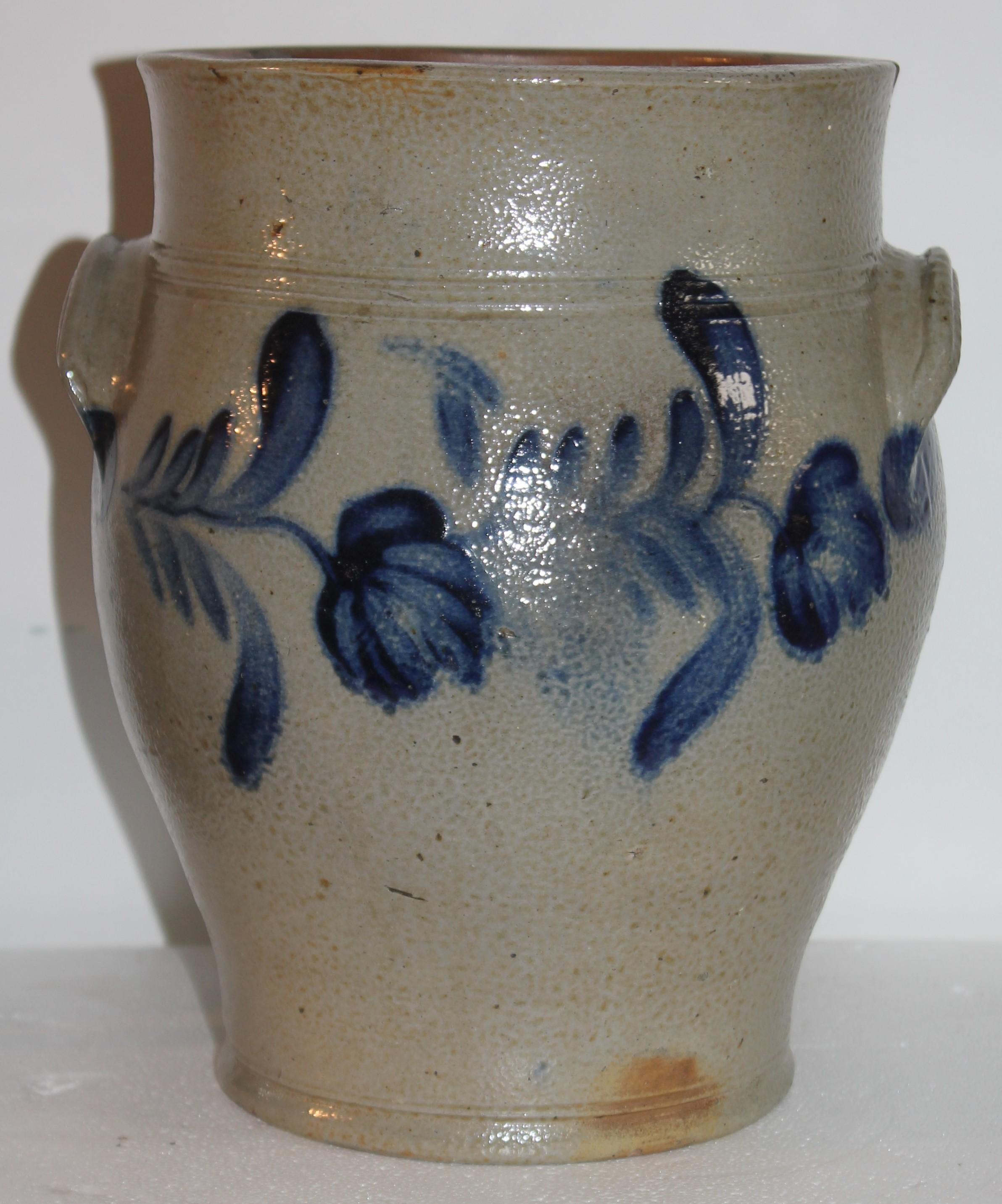 19Thc original decorated blue crock with double handles. The condition is very good with minor tiny chips on inner lip.