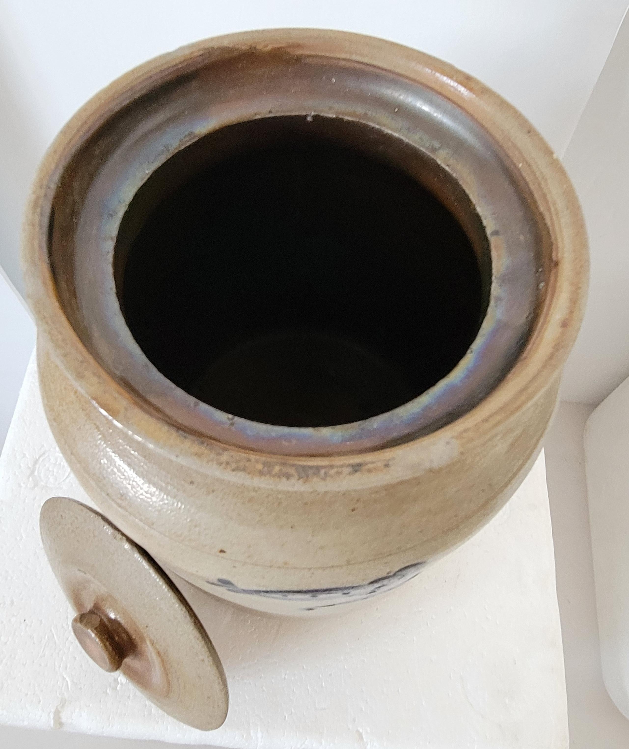 This fine 19Thc stoneware canister is in fine condition with minor chip on back side rim. There are no cracks in this crock or lid. It was found in Pennsylvania.