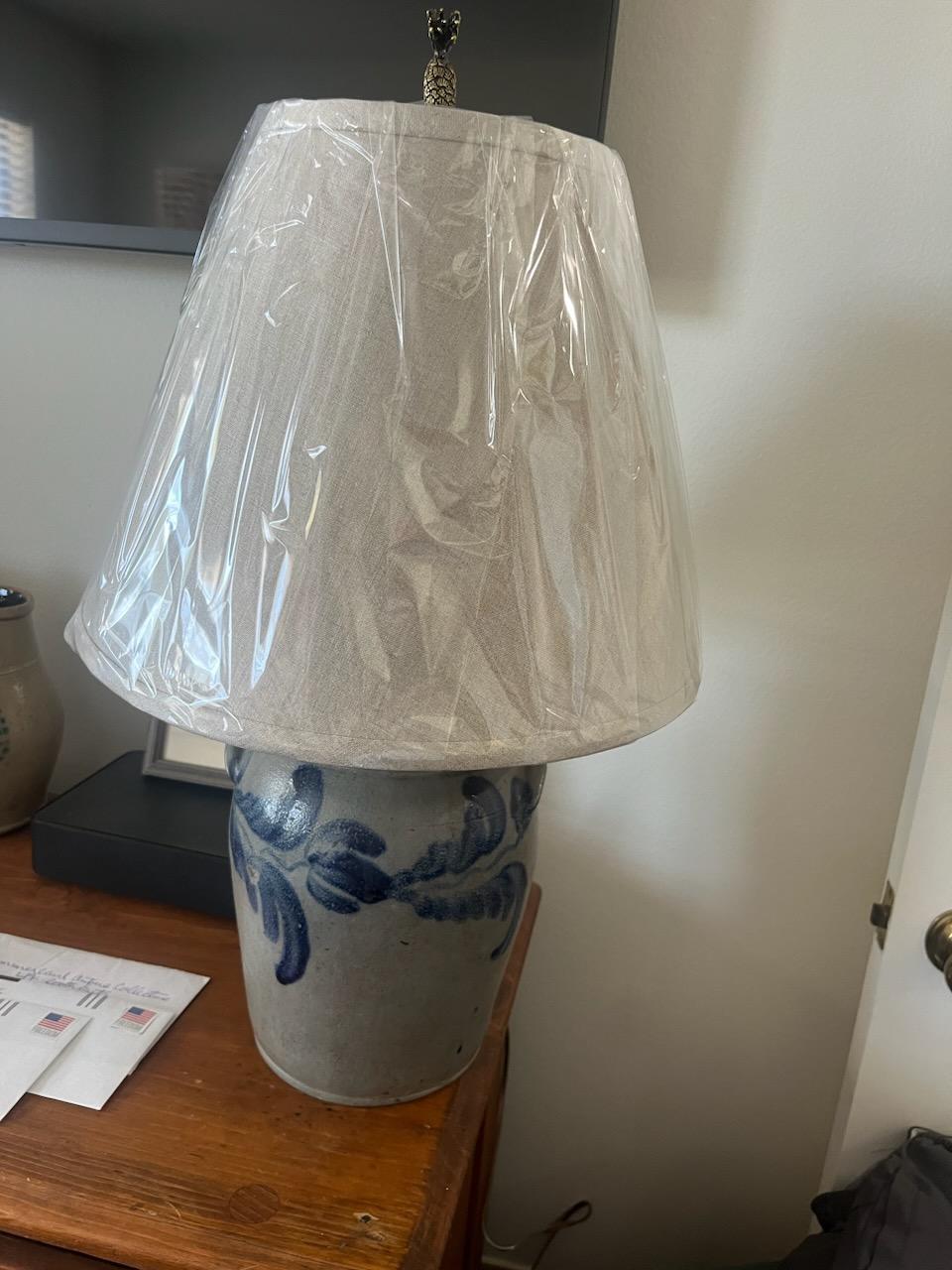 Newly Wired and electrified with linen shade. The decorated crock was made into a table lamp. The lamp portion of the piece is removable if user wants to use as a simple crock. Great used condition