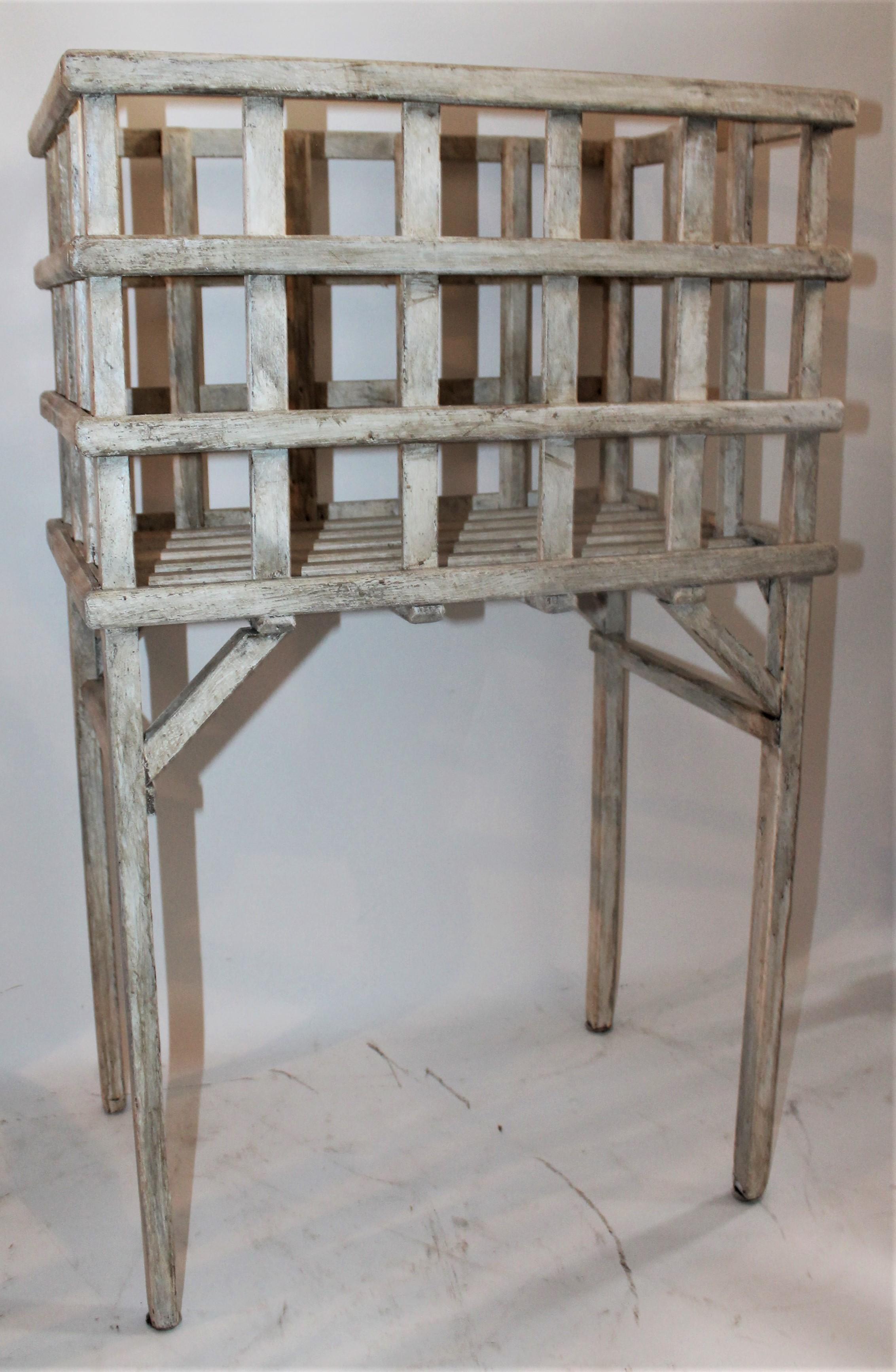 19th century old white over sage green painted basket on legs. It looks like a cage like display or holder of some sort. Great for a hooked rug or quilt collection.