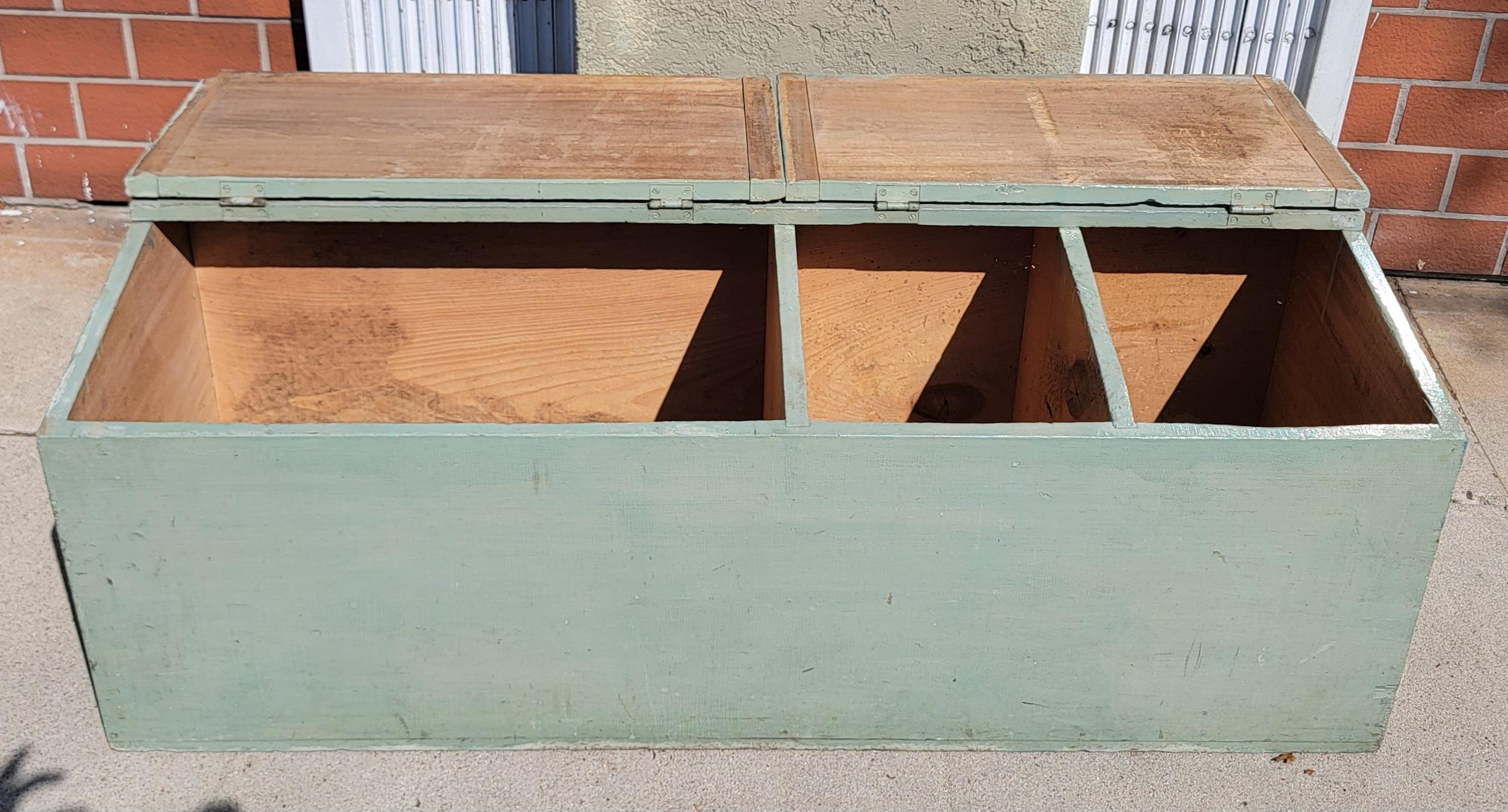 19thc wooden blue painted double feed bin with two lids. There are three compartments for sorting. Great as a bin/trunk at the edge of a bed or as an actual feed bin. 