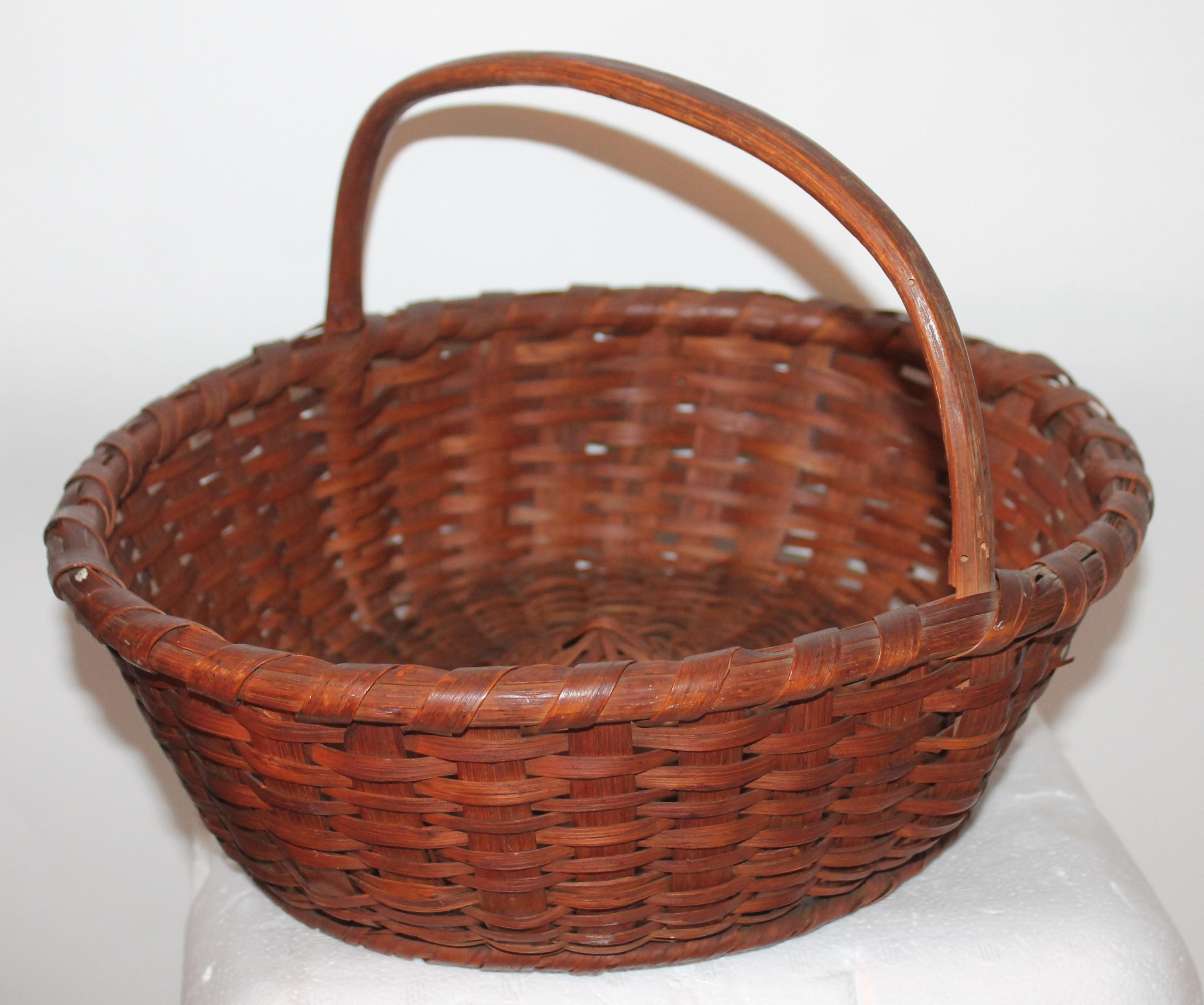 Country 19th Century Early Basket with Kick Up Base