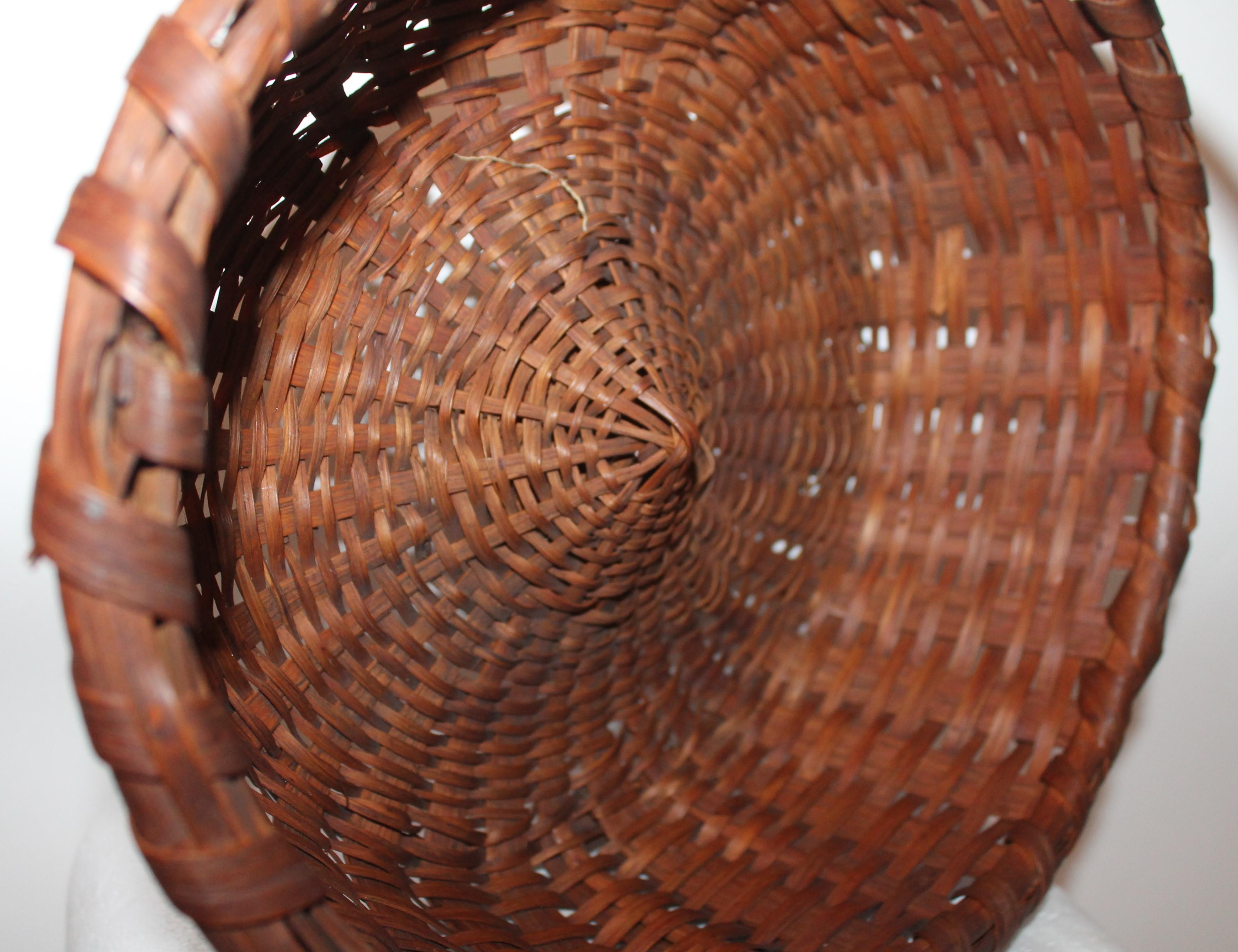 American 19th Century Early Basket with Kick Up Base