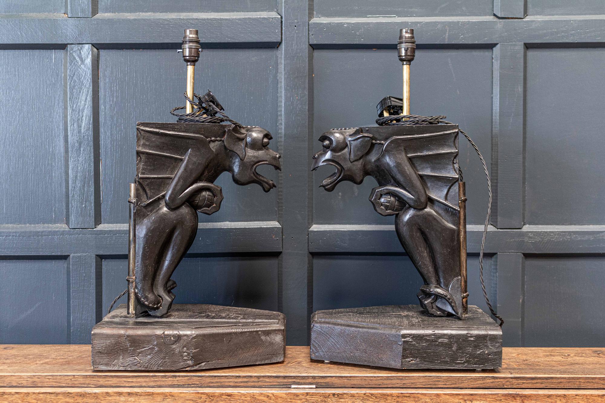Circa 1890.

19th c large ebonised carved winged serpent gargoyle table lamps

Originally hand carved winged serpent gargoyle wall brackets.

Wired and pat tested

Price is each.

  

Measures: W 24.5 x D 30.5 x H 57cm.