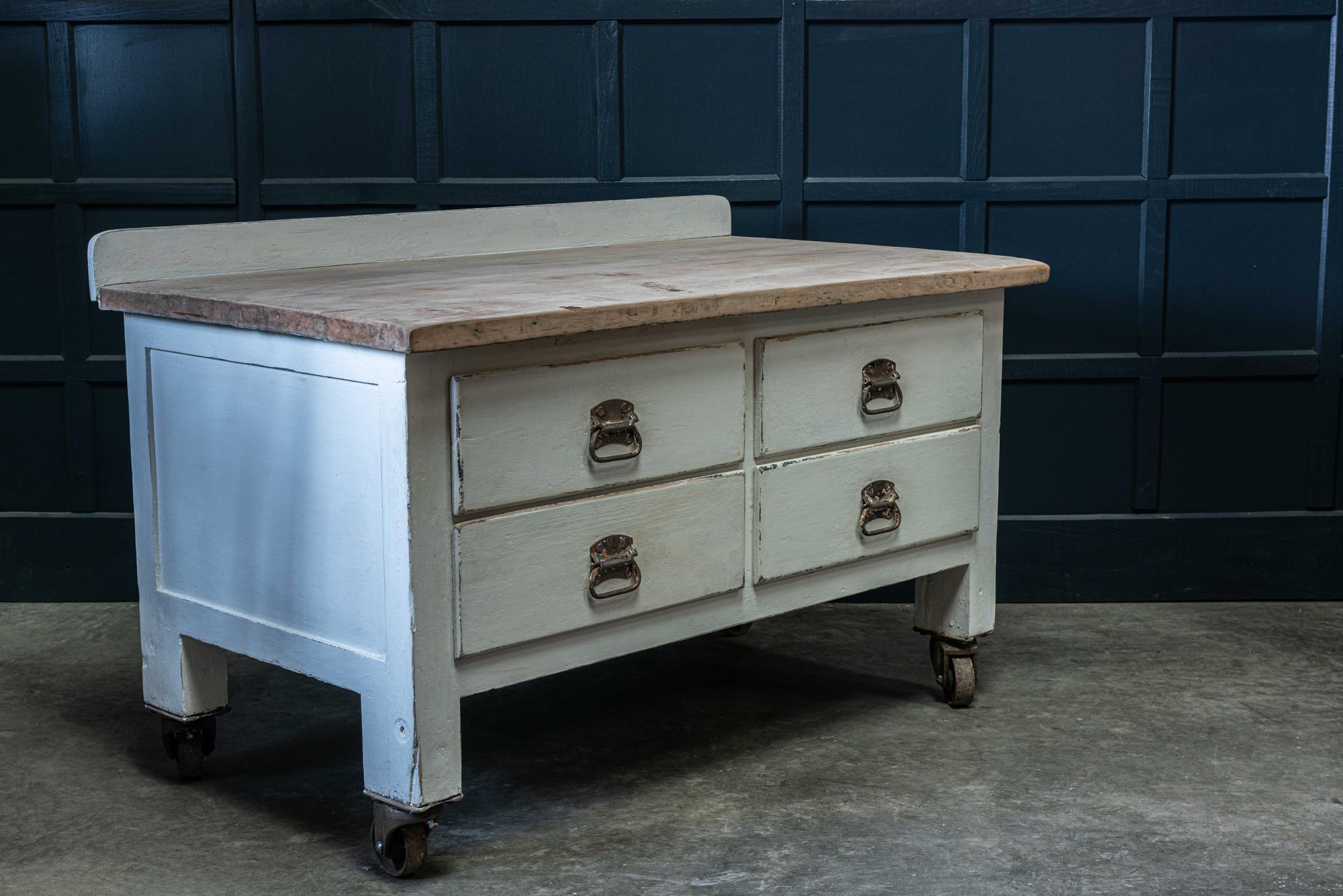 19th century Painted English bakers prep table with 4cm thick scrub elm top and upstand. Four deep dovetailed drawers with original hardware and castors. Ideal in the kitchen as a dividing central kitchen island or against the wall. The colour is