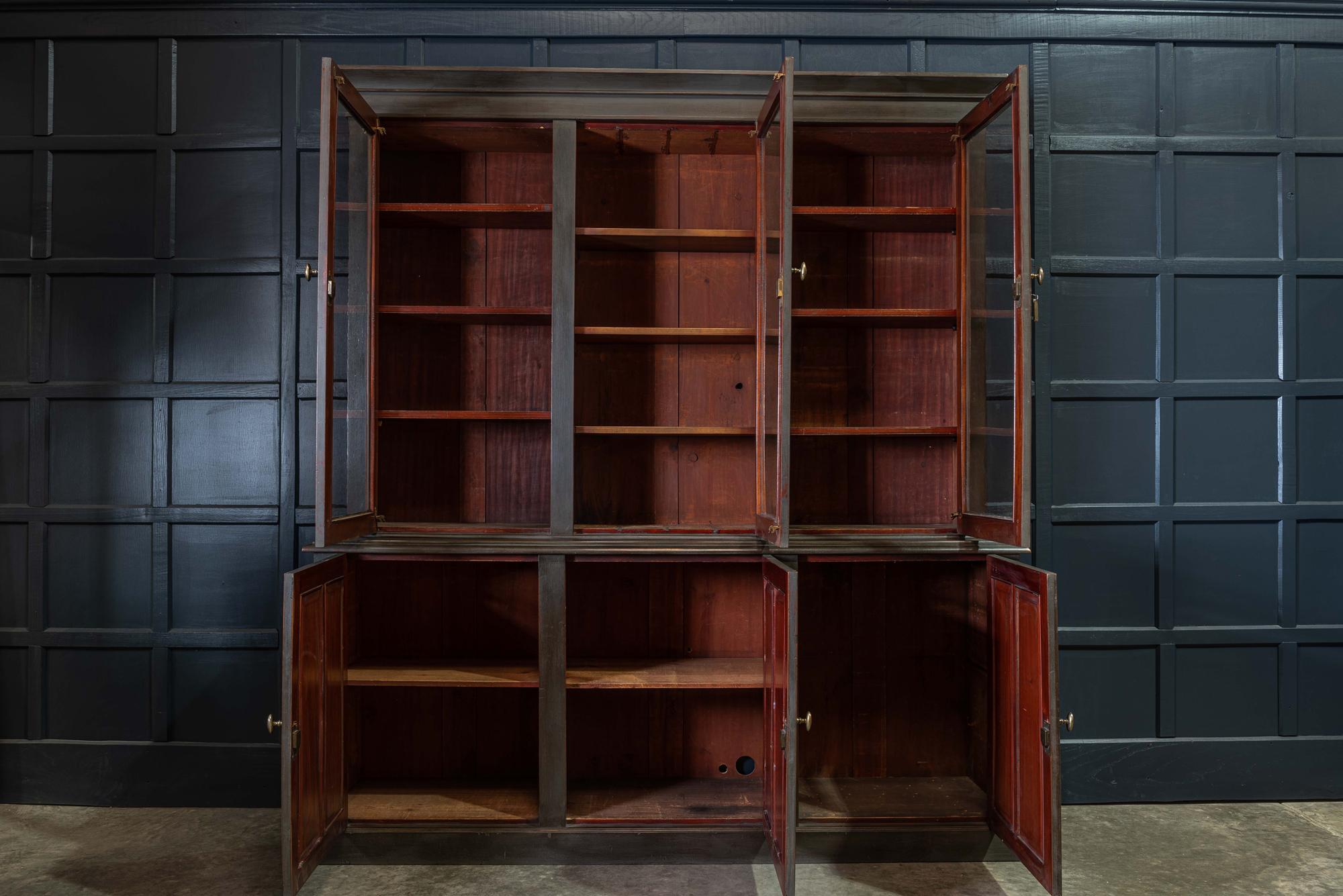 19th century English boardroom mahogany painted glazed bookcase,
circa 1884.

Mahogany Boardroom bookcase from 'The North East Coast Institution of Engineers & Shipbuilders' based in Newcastle. With adjustable shelves to the outer cabinets and