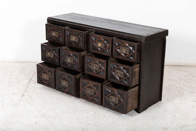 Circa 1800

19thC English Carved Oak Apothecary Drawers with 12 dovetailed drawers & original brass hardware

Measures: W125 x D43 x H74 cm.

 Internal drawer size W24x D34x H16cm

