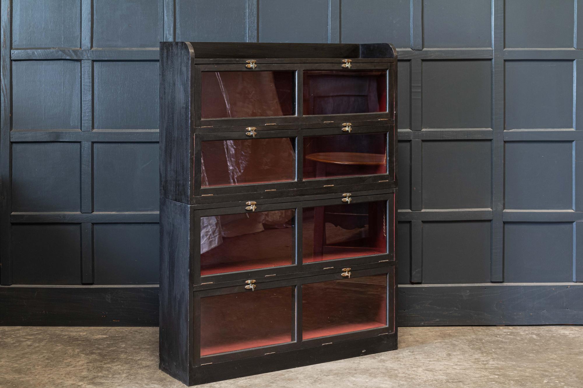 Circa 1890.

19thC English ebonised oak glazed drapers shop fitters cabinet with original hardware.

Two stackable sections.

sku 549

Measures: W 107 x D 28 x H 139cm.
