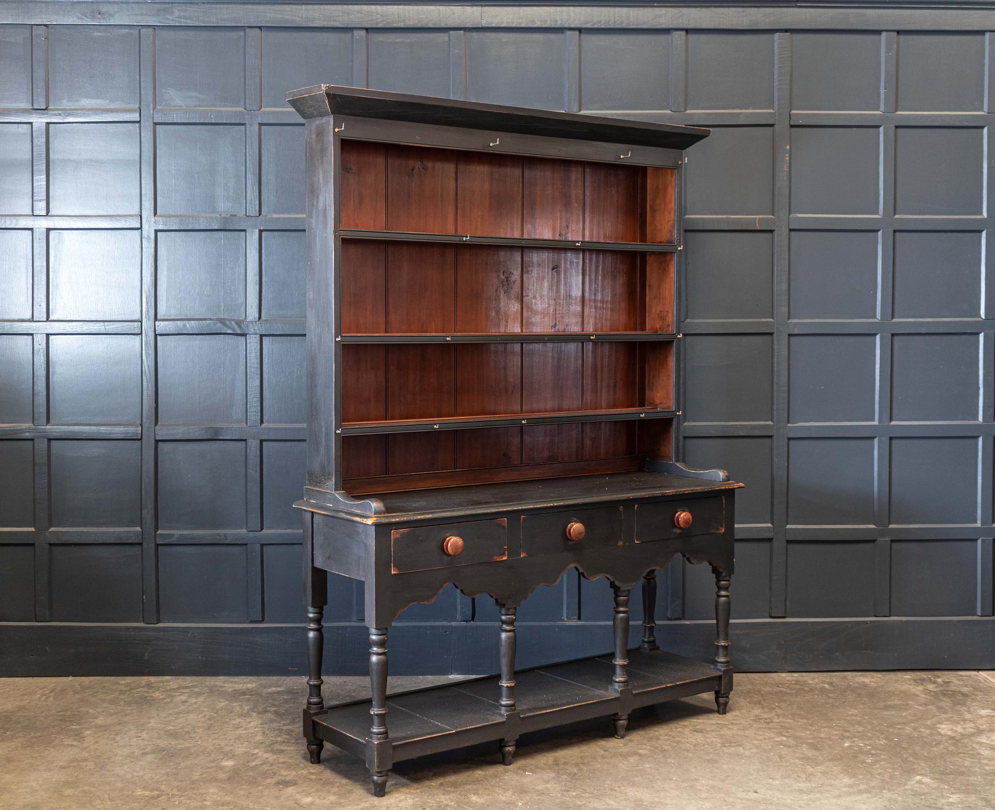 Circa 1850.

19th C English Ebonised Potboard pine dresser

Lovely scale shape and proportions

   

Measures: W 159 x D 47 x H 208cm.

(159cm cornice)