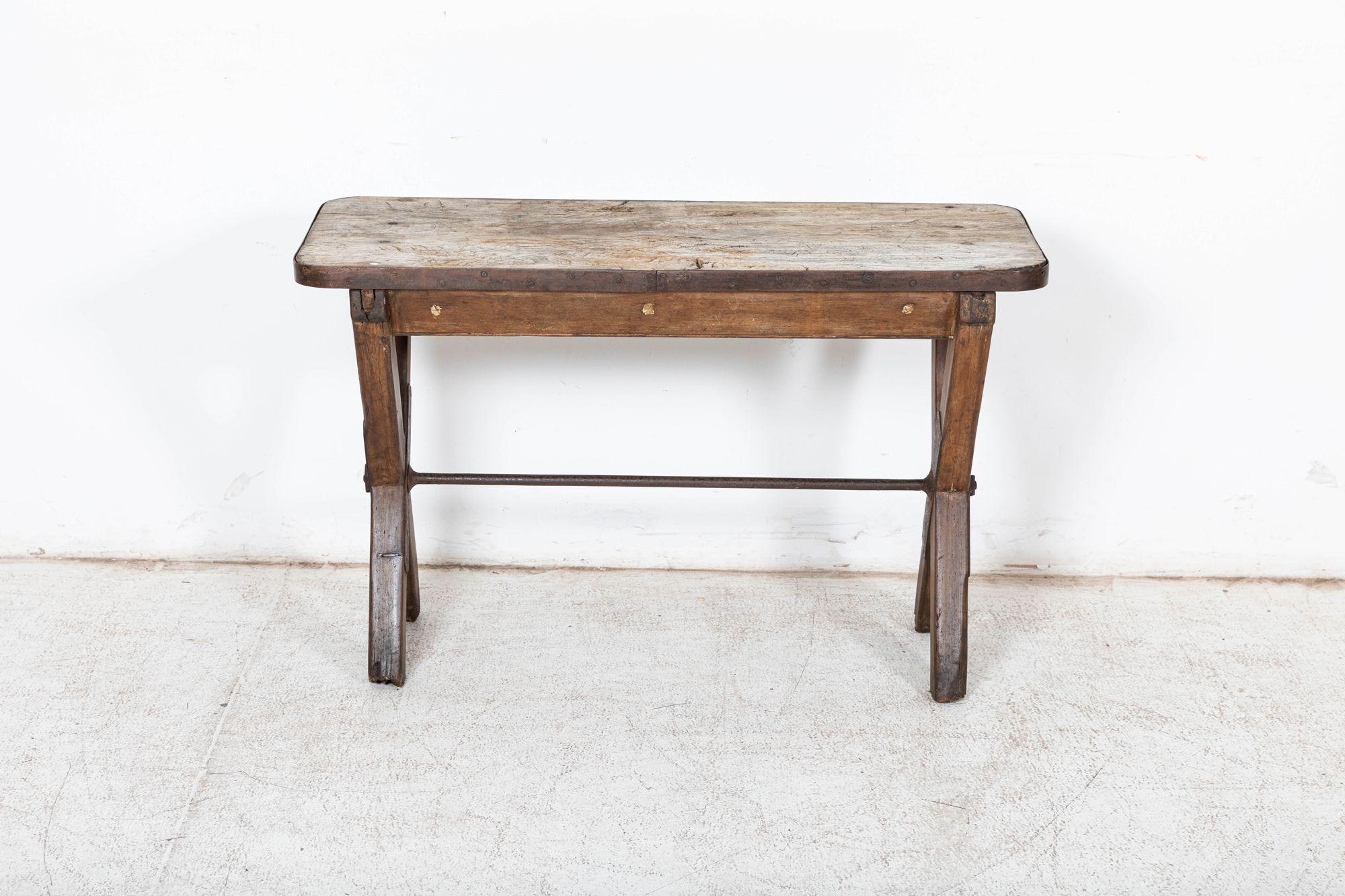 Circa 1870
19thC English Elm Topped Tavern Table with Iron Stretcher, Pine legs, and Banded Top.
(losses)
sku 1086
W115 x D46 x H72 cm