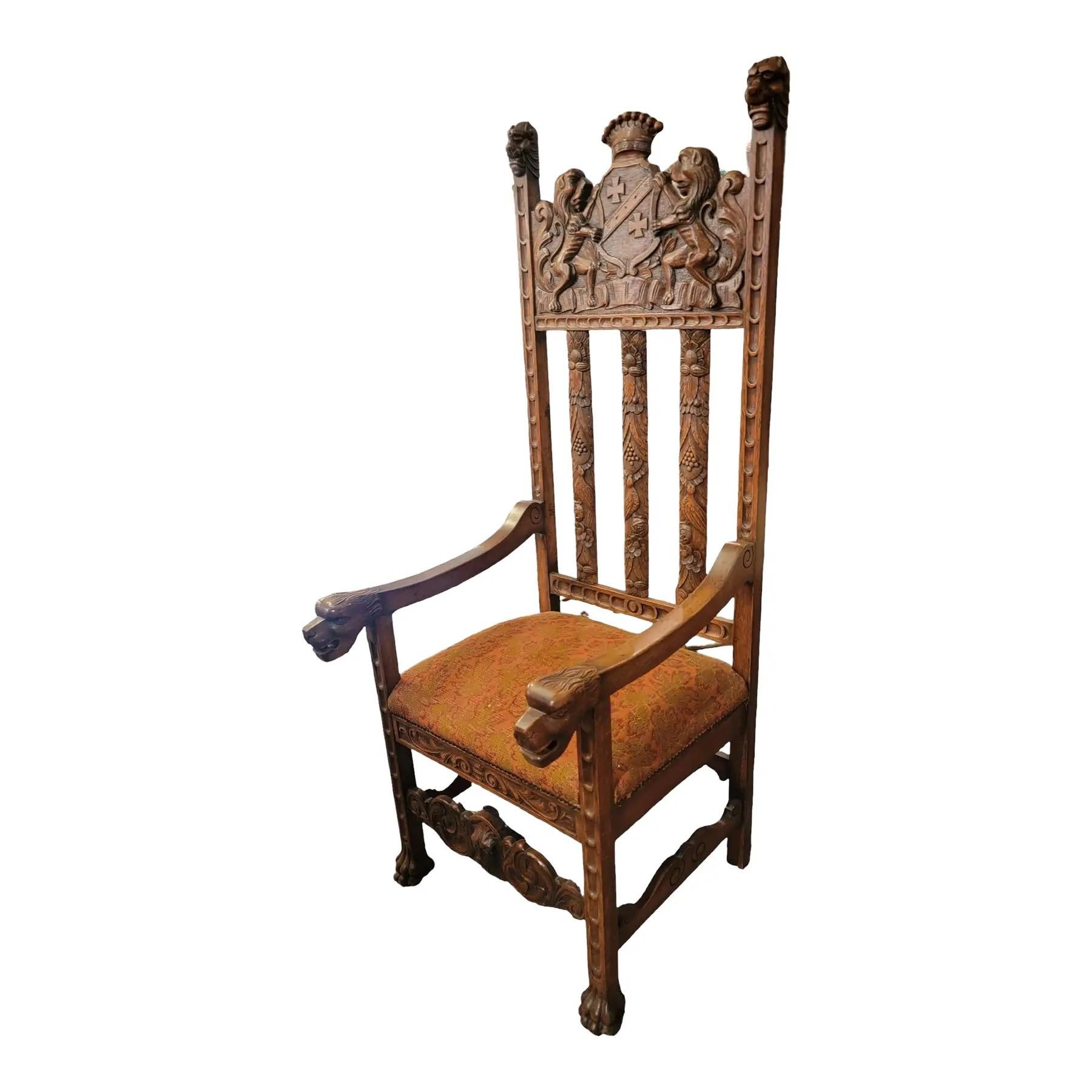 19thc English  Hand Carved Wooden Kings Chair. Wonderful design on the slats of the chairs. wonderful carving at the top of the chair has 2 lions holding a shield over/ behind the head of the person sitting.
Measures approx.  - 27d x 25w x 63.5h and