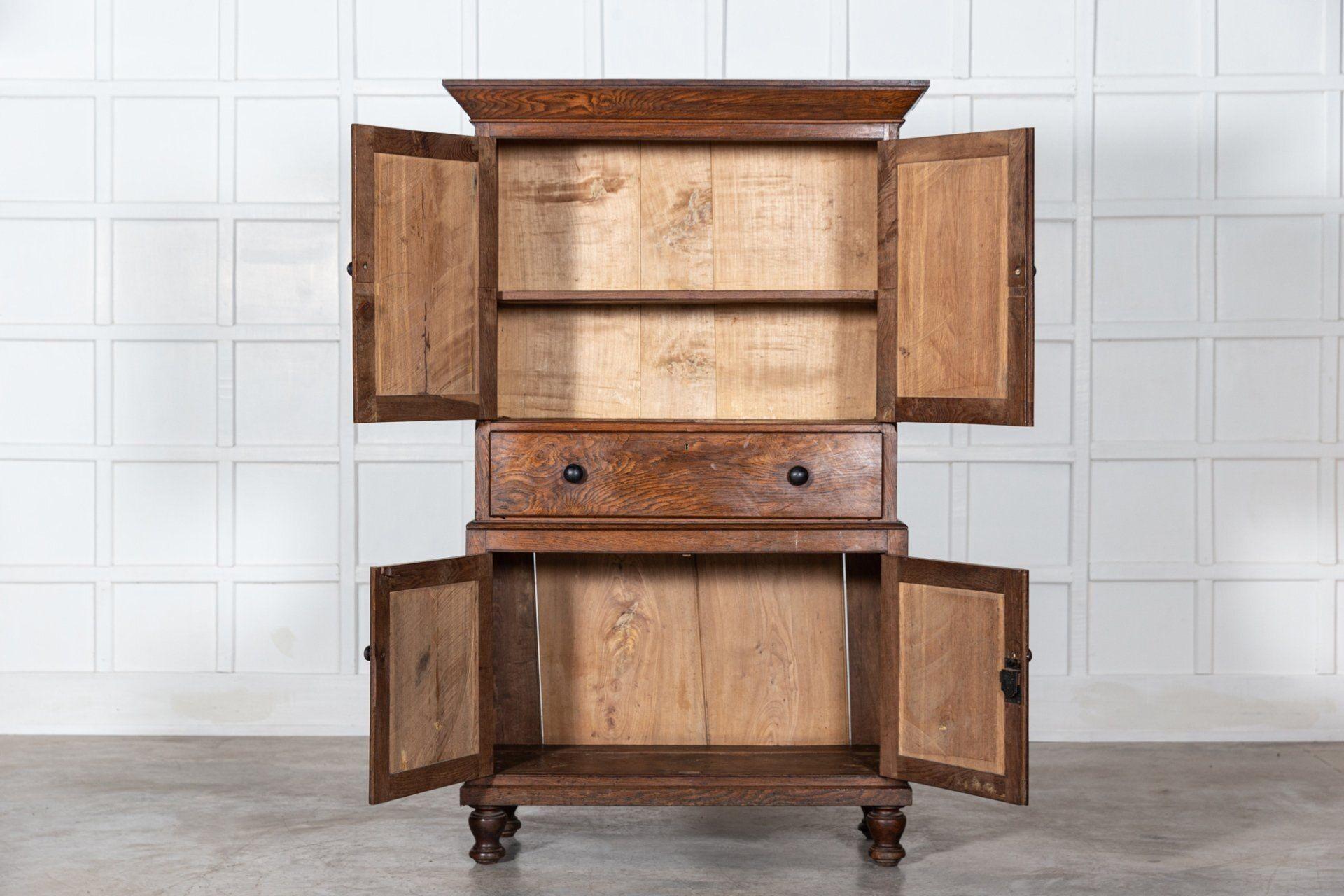 Circa 1850
19th C English oak & elm housekeepers cupboard.
sku 1270
Excellent form and colour.
W119 x D54 x H194 cm.
Base W112 x D50 x H86 cm.
Top W119 x D54 x H108 cm.