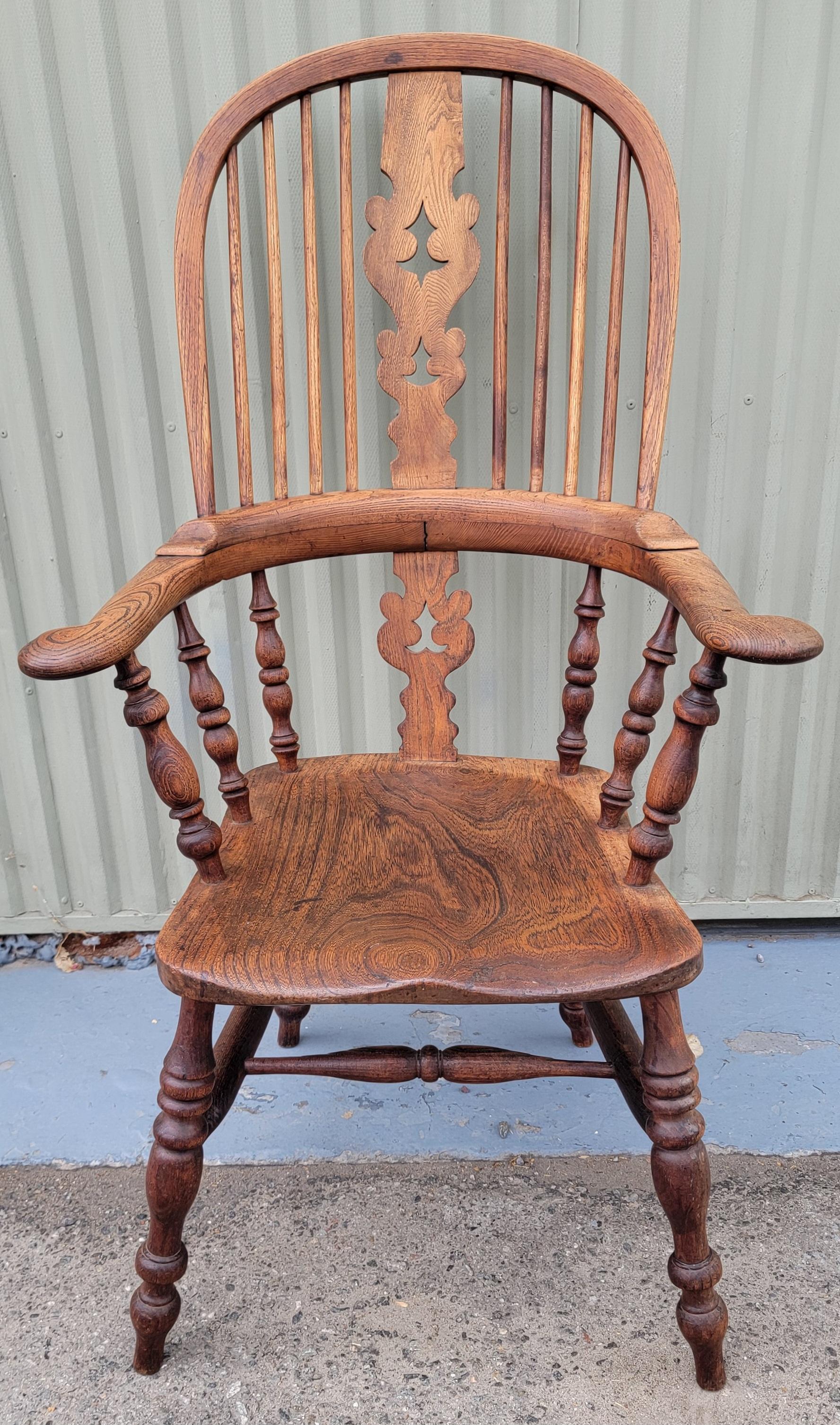 The arms on the slightly browner chair are 1.5 inches higher at 28 inches.These chairs are super comfortable and have a wonderful aged patina.