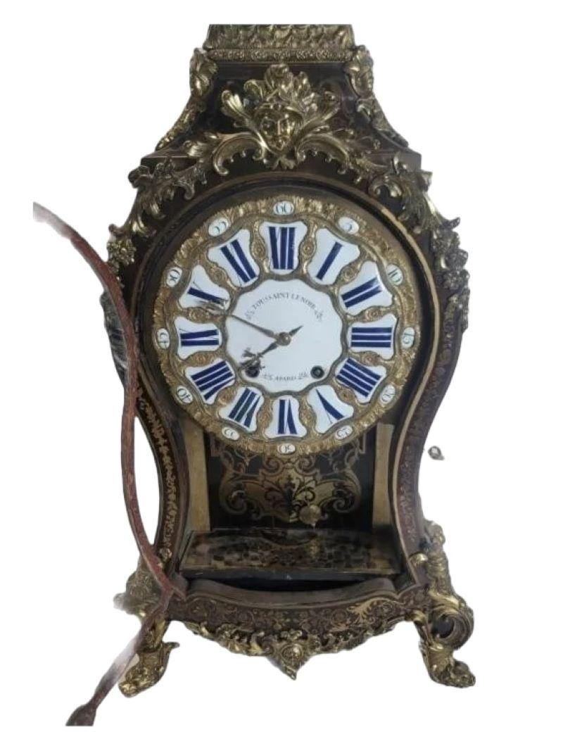 19thc Exquisite Monumental French Boulle Turtle shell Clock w/Pedestal by Toussaint Lenoire. wonderful floral and ivy stencil work through the entire wooden frame. Lots of great work with the bronze showing a man riding a lion. The corners and top