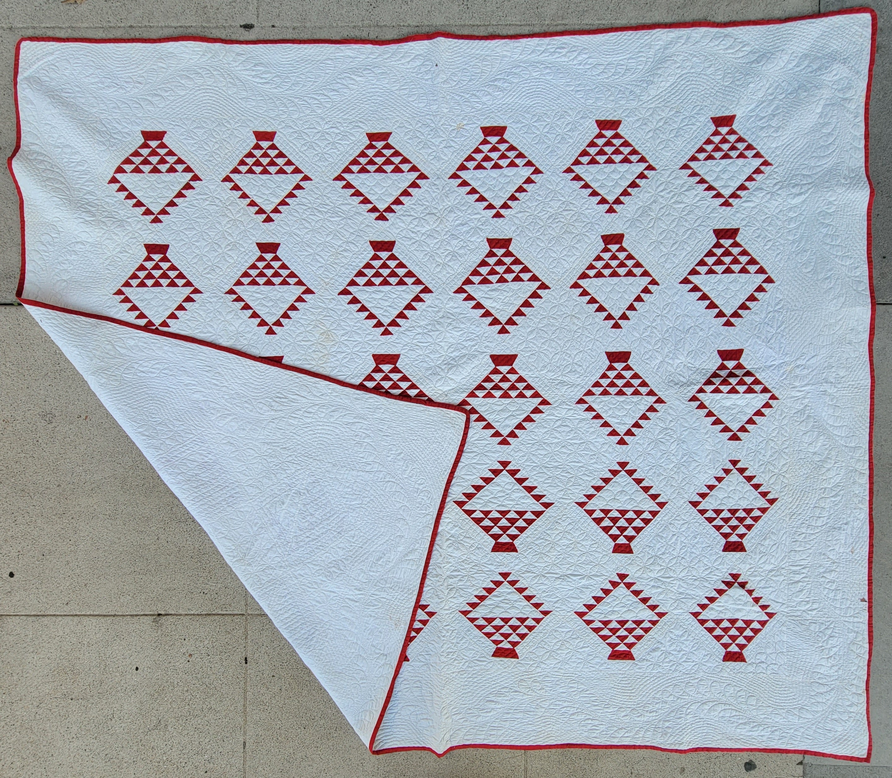 This amazing baskets of chips quilt is in a cherry red & white in very good condition. This quilt was found in Ohio and it is in fine condition.