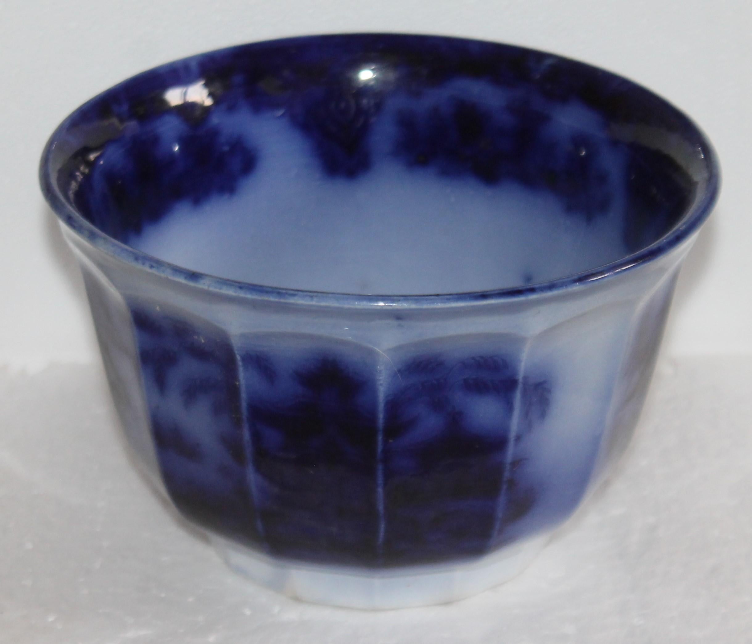 19th century flo-blue waste bowl that the pattern looks like Shapoo but it is too hard to see the pattern as its smeared together.