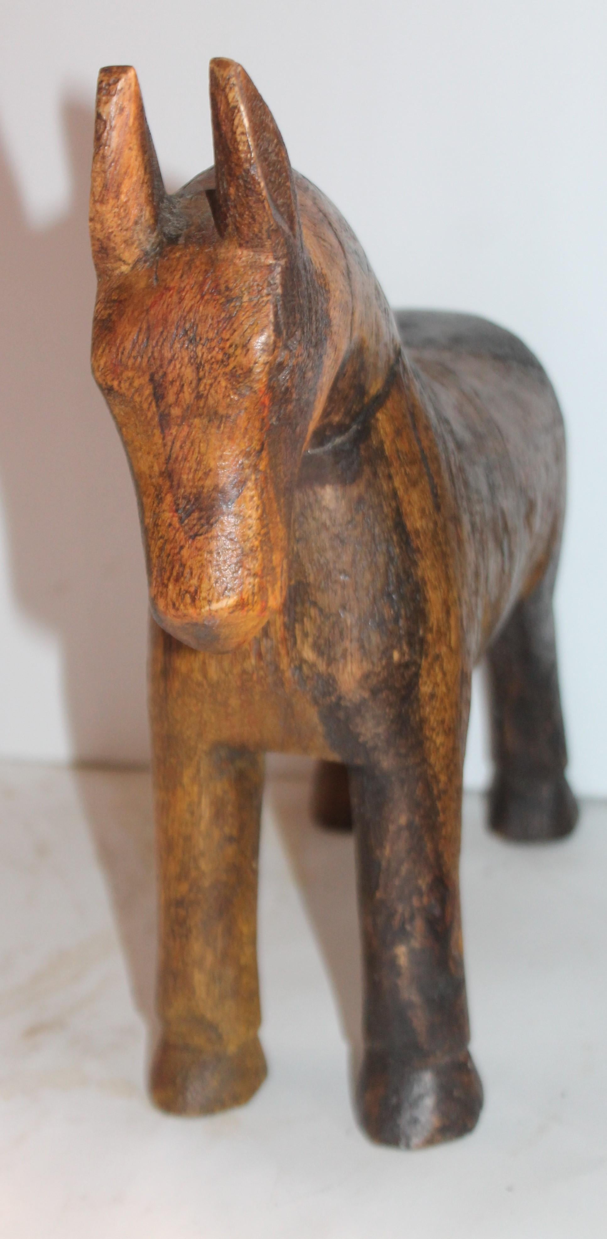 This fine folky hand carved jackass is in great condition and is as found. You can see it was painted at one time as there are fragments of paint.