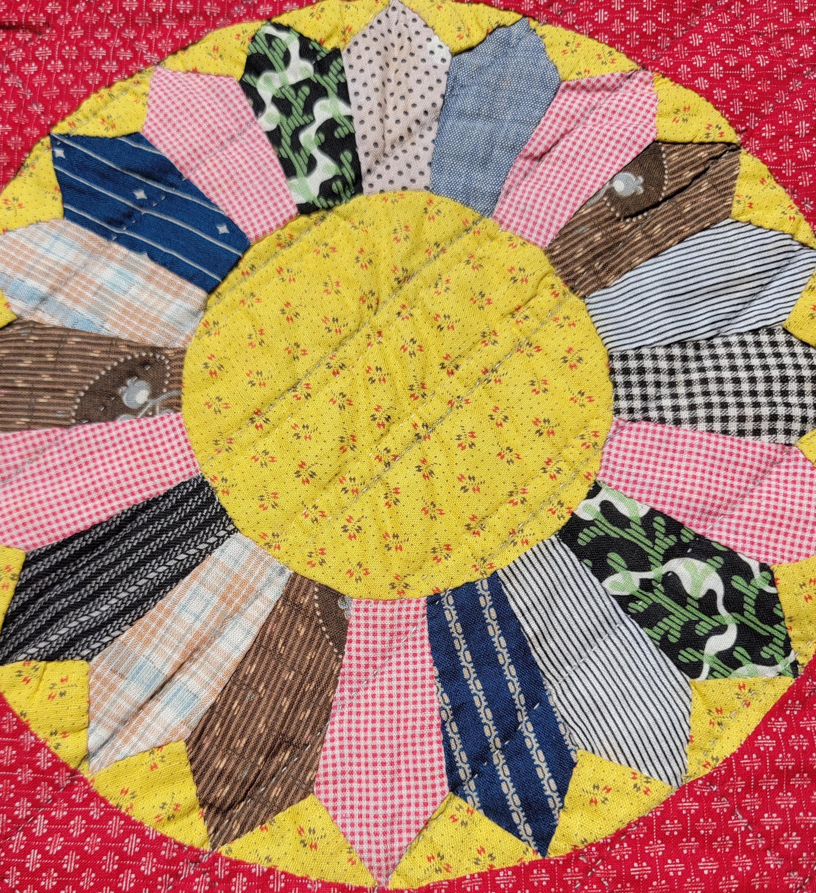 19Thc Folky cotton sunflower quilt from Ohio is in fine pristine condition.Such wonderful piece work and quilting.The red calico back round is fantastic. Condition is pristine.There is no wear what so ever on this unused quilt.