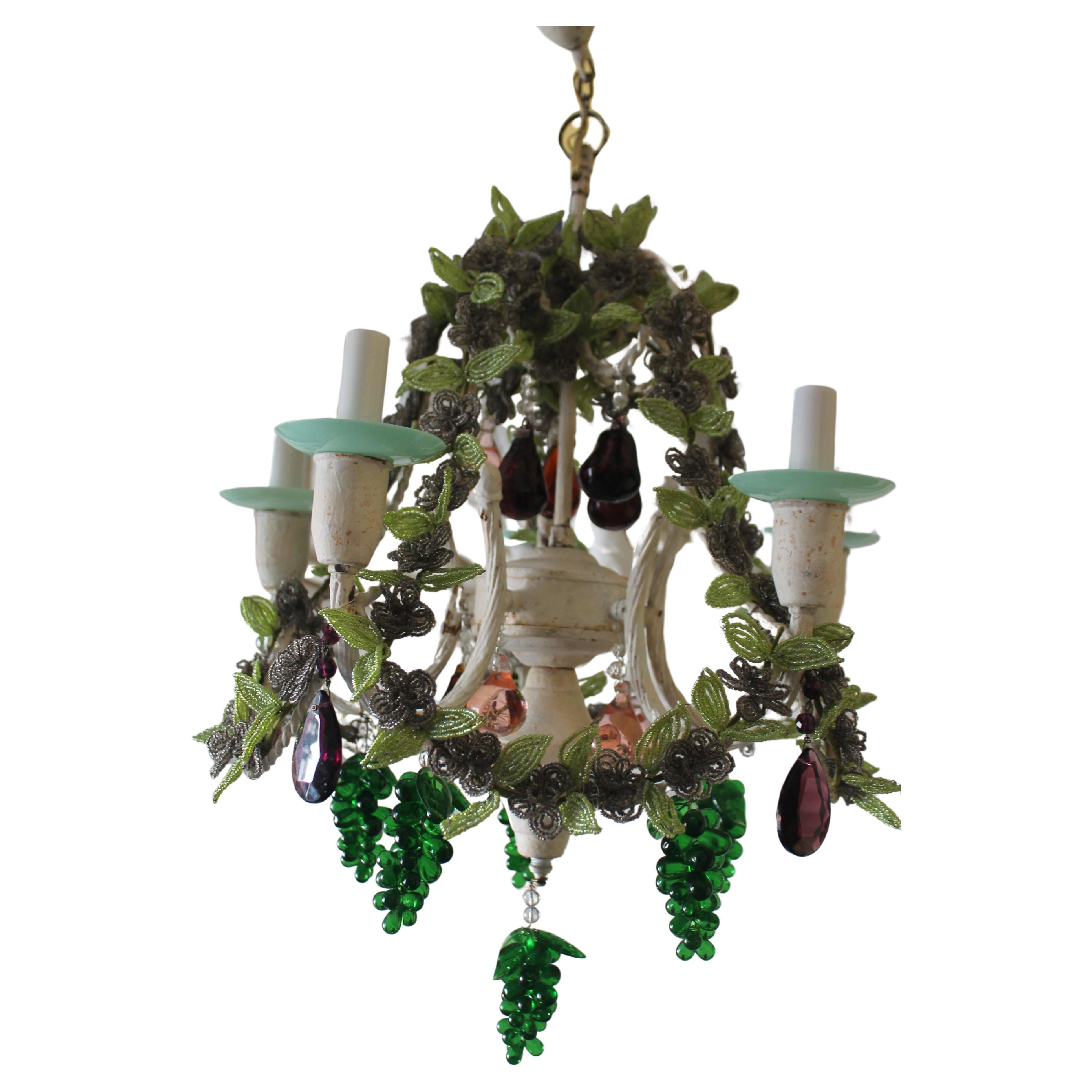 c1890 French Antique Art Nouveau Crystal Micro Beaded Chandelier. This chandelier is exquisite!. Crystal micro beaded amethyst and verde flowers and petals climbing the chandelier vines. This originally had a bronze frame but somebody along the way