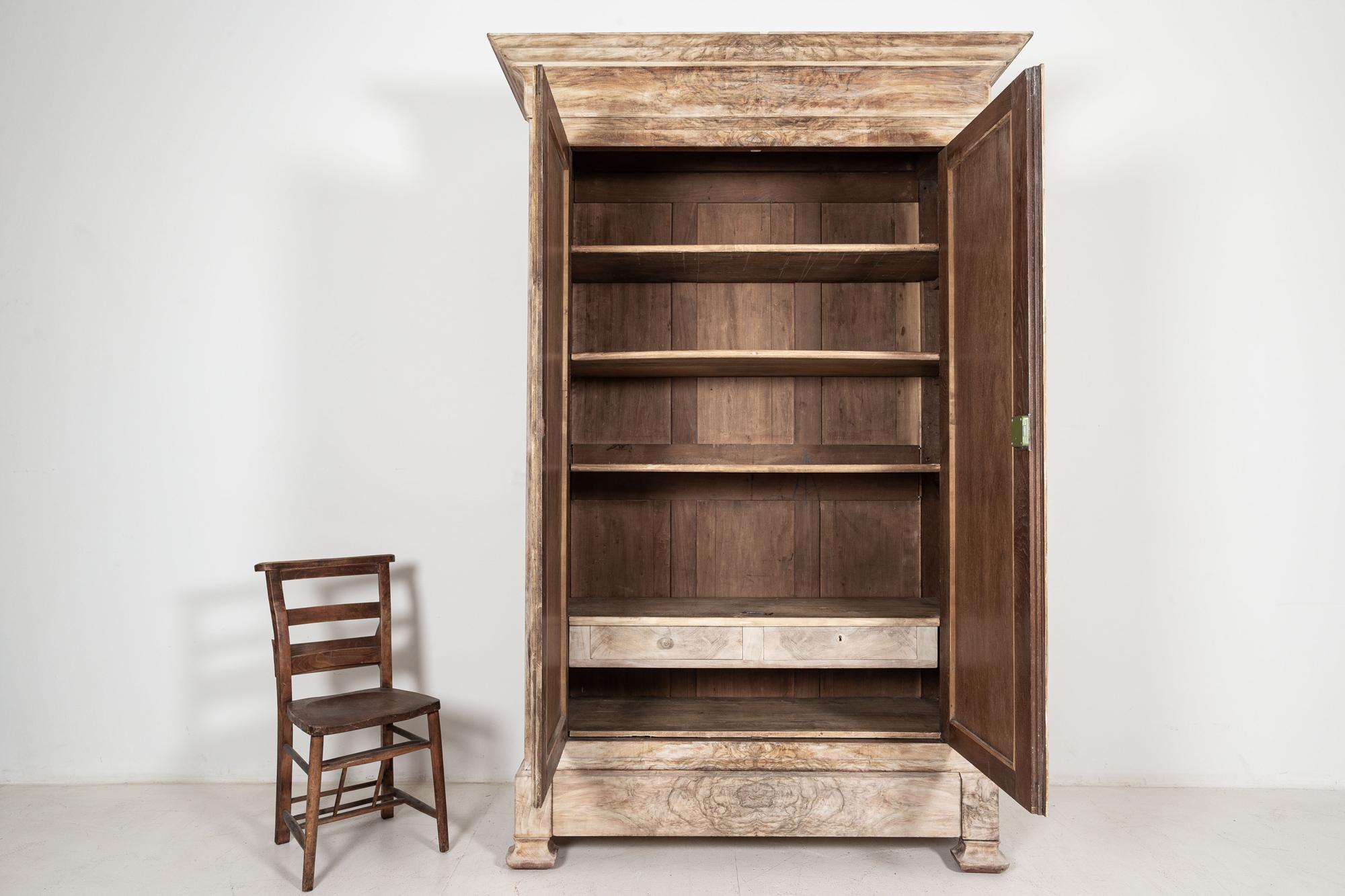 Circa 1840

19thC French Bleached Walnut Veneer Armoire with adjustable shelves

Sourced from the South of France

sku 794

W151 x D50 x H231 cm