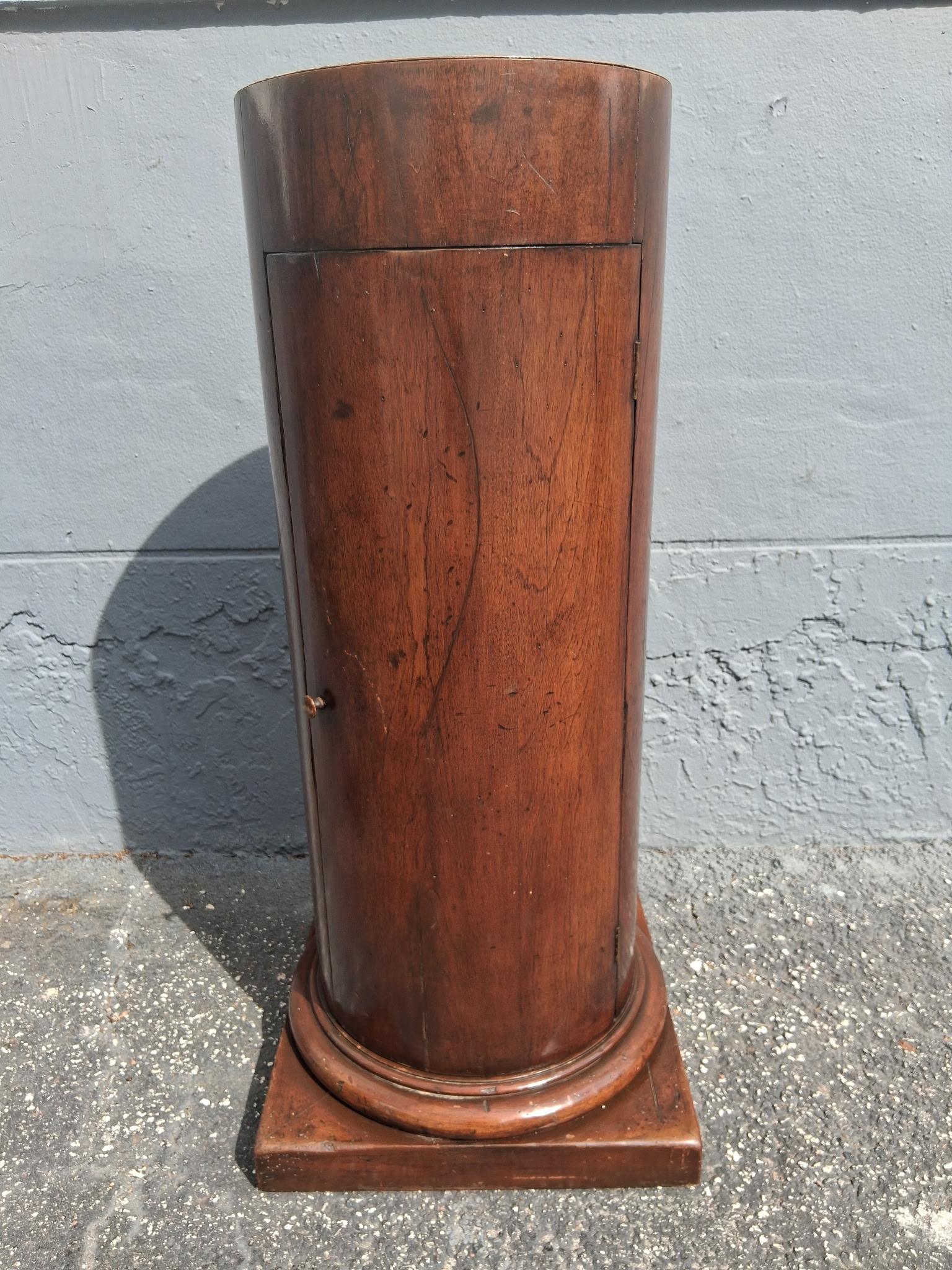 19thc French Antique Classical style Column Form Display Pedestal Cabinet. Opens to reveal interior storage. Carved wood.