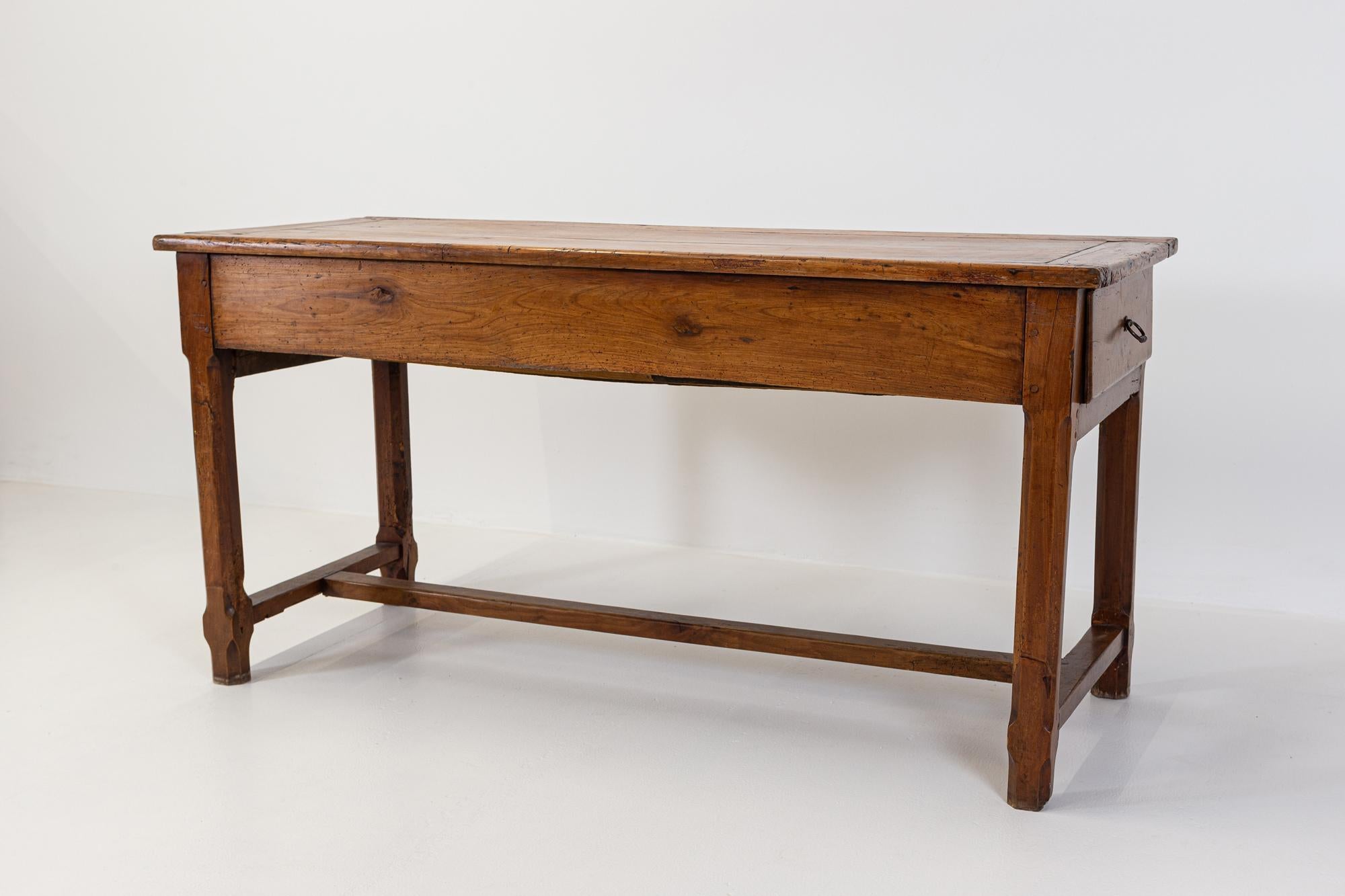 Circa 1810.

19thC French fruitwood farmhouse table

H stretcher, two end drawers with chamfered and pegged legs

Sourced from the South of France

(Signs of past leg repairs)

Measures: W 162 x D 68 x H 80 cm.
 
 