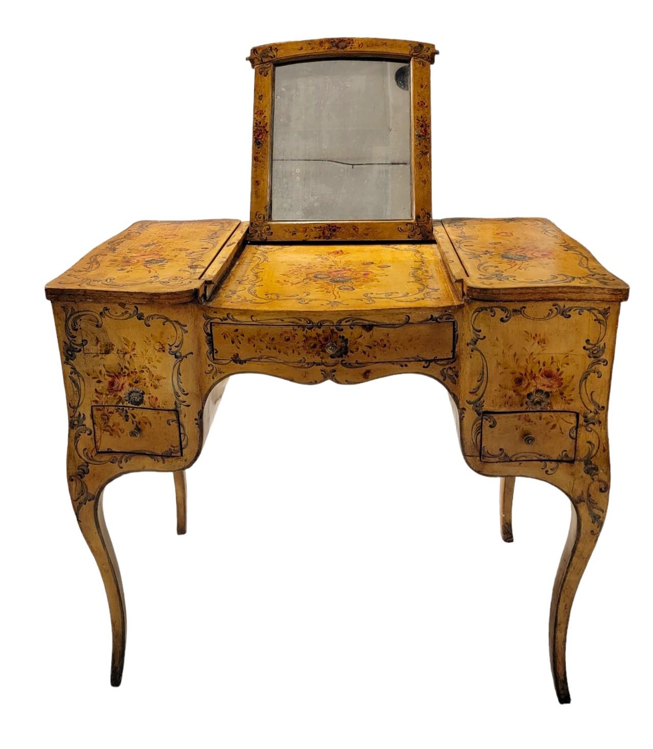 19thc French Hand Painted Desk/Vanity Wth Mirror. This amazing vanity has 3 drawers, 2 side compartments and a flip up mirror. Wonderful Old Floral stencil design. Wear consistent of age and use.  35w x 20.5d x 30h