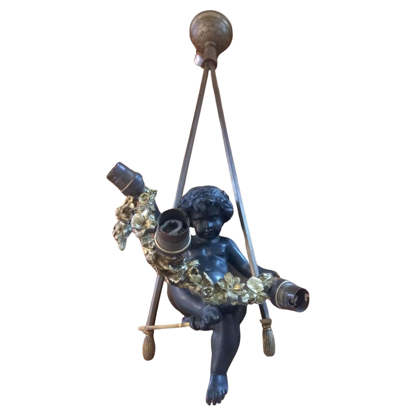 19thc French Napoleon III Gilt&Patinated Bronze Cherub with Garland on His Swing For Sale