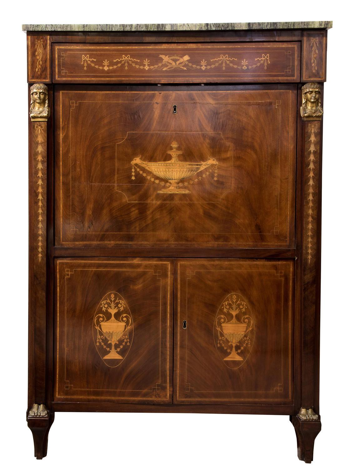 A 19th century French secretaire a' abbatant. The marble top over a marquetry inlaid mahogany base with a single drawer over the fall front and pair of lower cupboards flanked by caryatid mounts.