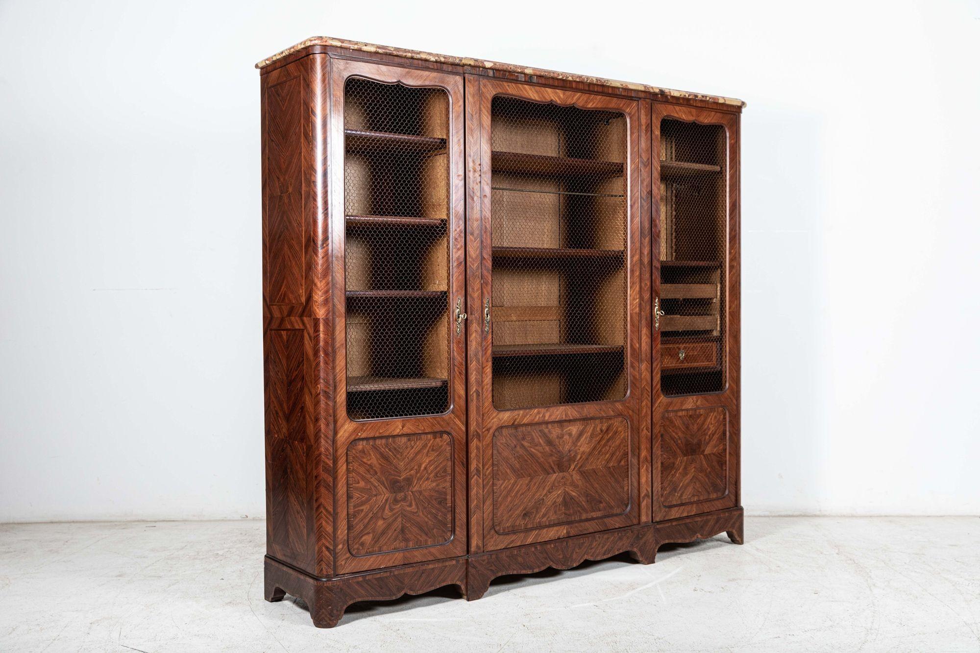 Circa 1890

19th C French walnut armoire / bookcase with wired grill doors and book matched walnut veneer with marble top.

Sourced from the South of France

Measures: W188 x D40 x H174 cm.

 