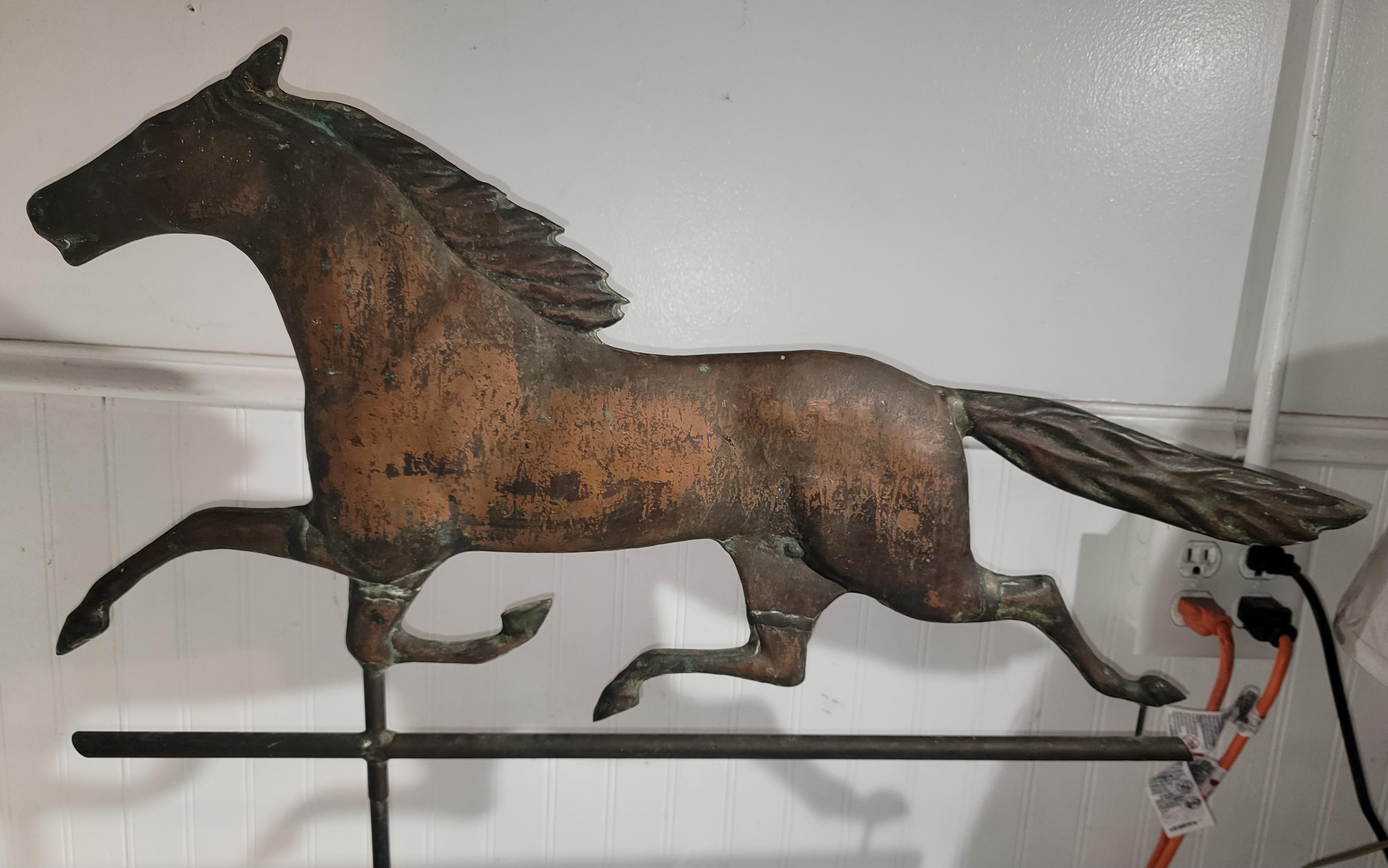 This fine full body copper horse weather vane has a amazing patina  & surface.Found in a private folk art collection.The form is amazing with such a graceful form.

Height and weight will vary slightly as we may accommodate a different base.  (base