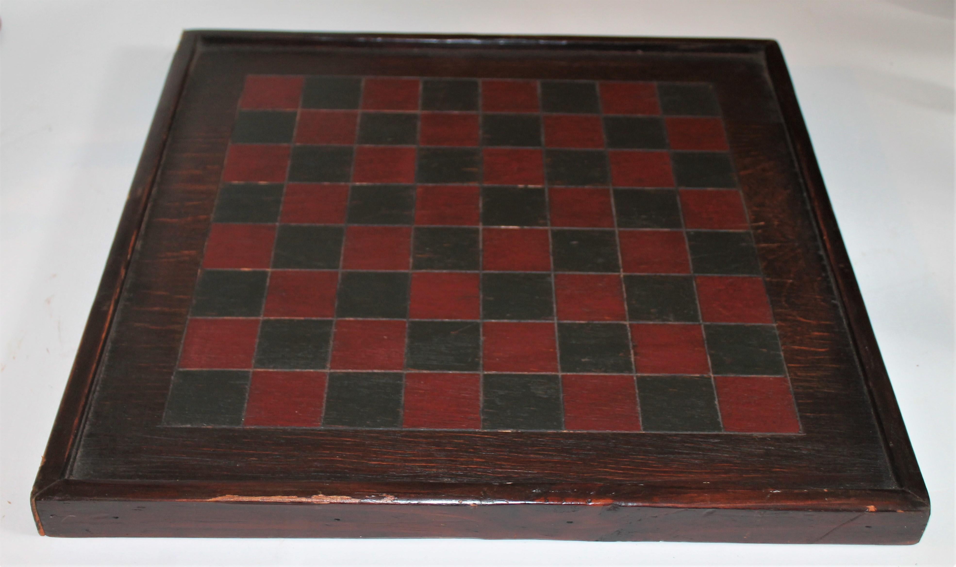 19th century game board in original painted surface from Pennsylvania. The paint is fantastic.