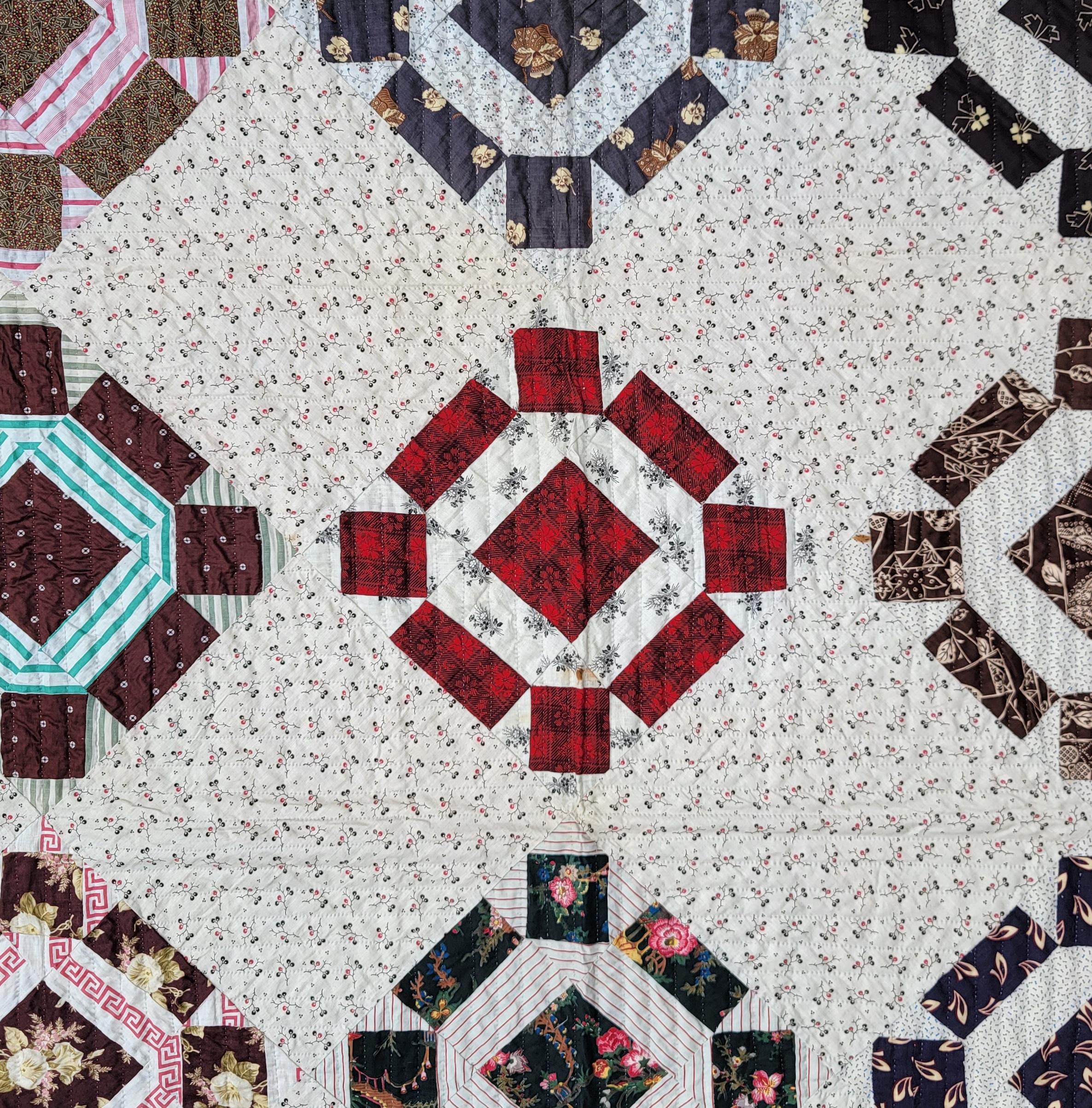 This fine 19thc early fabrics geometric blocked pattern quilt is in such amazing condition and most unusual pattern.