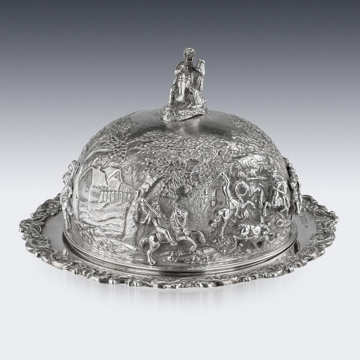 Antique 19th century Georgian solid silver muffin dish, of outstanding quality, the domed cover profusely chased and applied with battles scenes in high relief, the finial modelled as a man with clay pipe seated against a barrel, decorated
