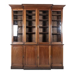 Bibliothèque en acajou glacé du 19ème siècle avec fronton